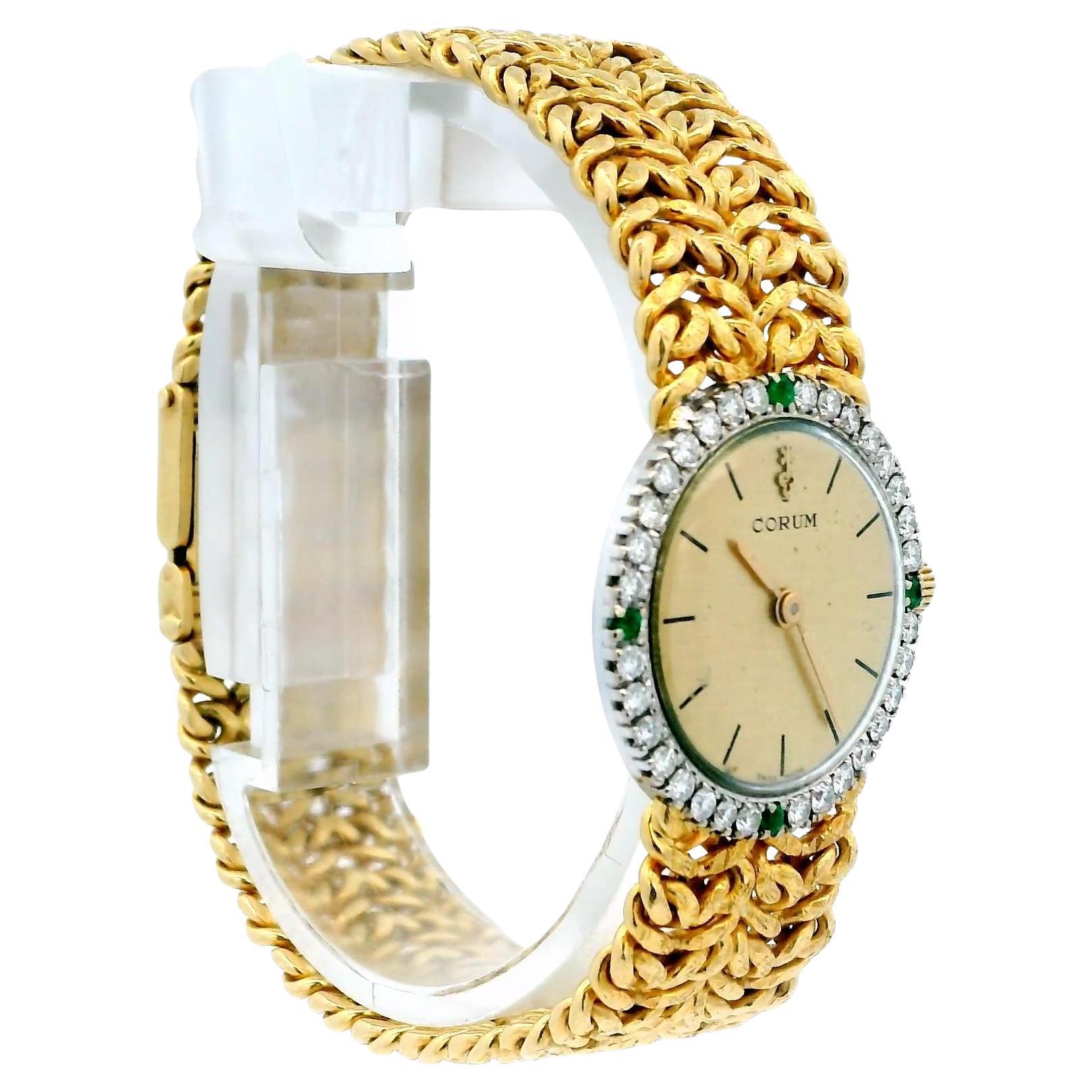 This luxurious Corum watch is meticulously crafted from 18k yellow gold. The bezel is enhanced with 1.0 carat of round, brilliant white diamonds, boasting a clarity grade of VS1 and a color grade of G. In addition, four green emeralds are set into