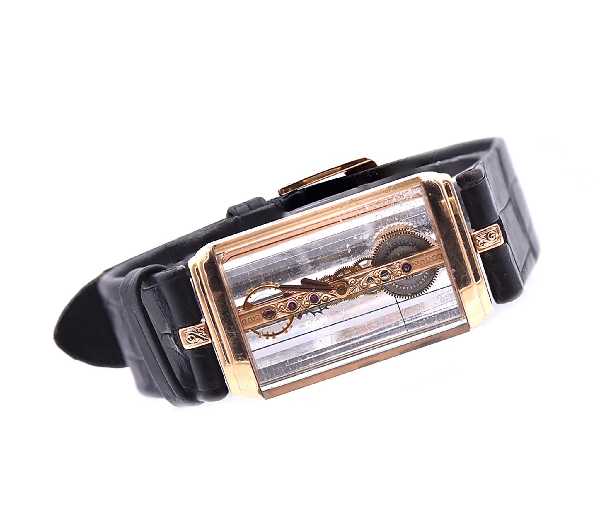 Movement: manual wind
Function: hours, minutes
Case: 20 x 34mm 18K yellow gold and Lucite rectangular case, sapphire crystal, push/pull crown
Band: black leather bracelet with buckle
Dial: skeleton dial, gold hands
Reference: 13150
Serial #: