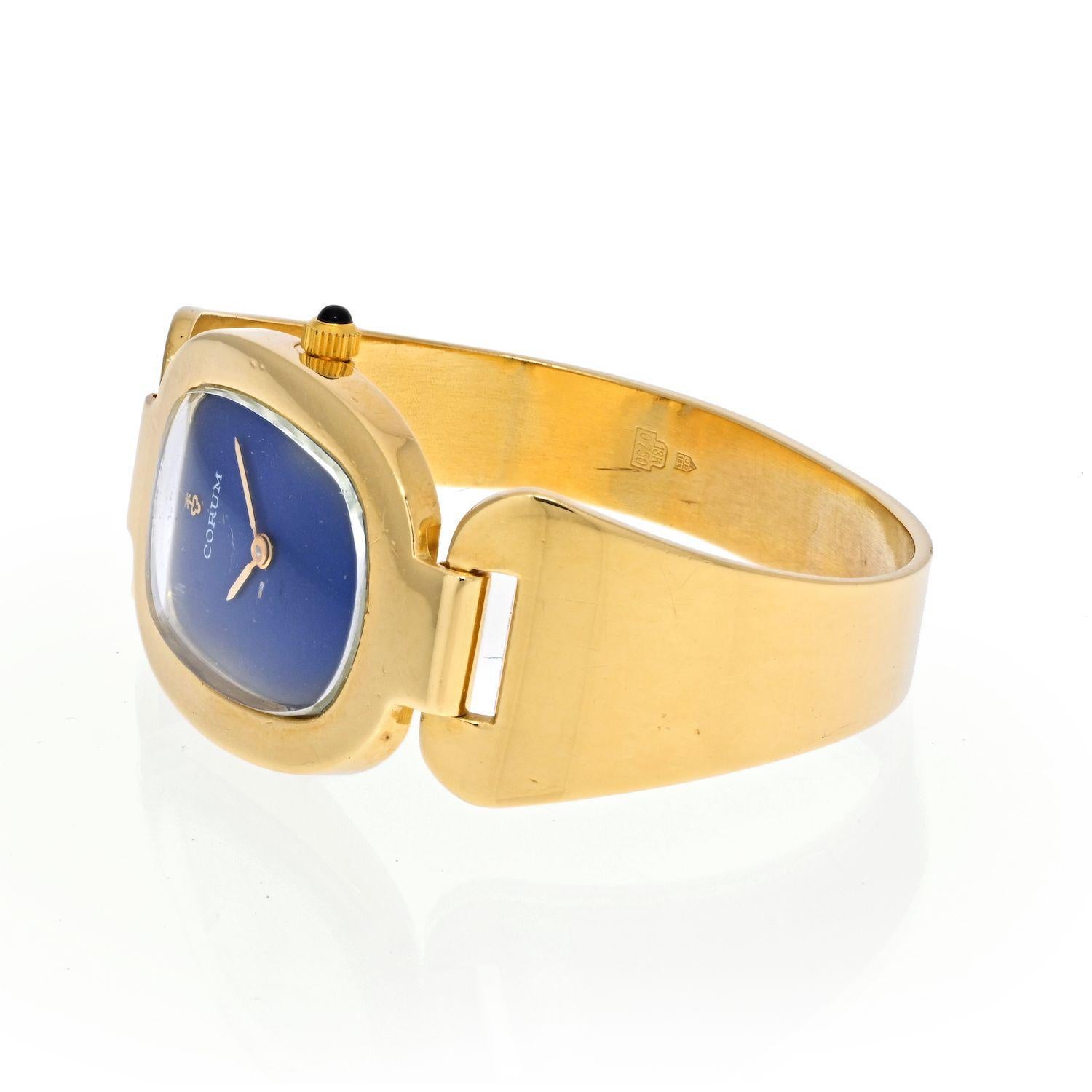 corum 18k gold watch