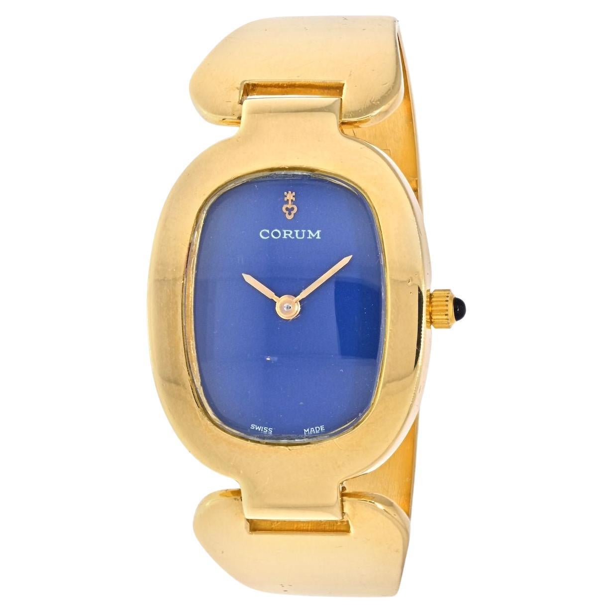 Corum 18K Yellow Gold Oval Blue Dial Wrist Watch