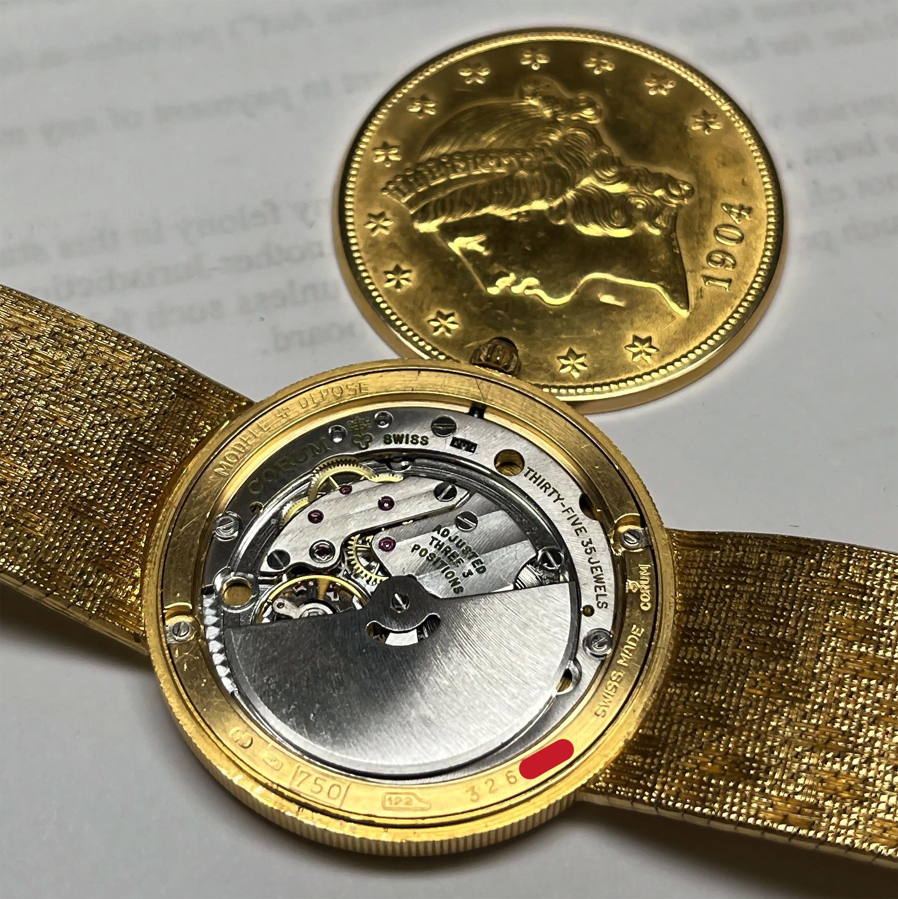 Collectible Corum $20 Coin watch dial signed Tiffany & Co. double eagle. 18k mesh bracelet. Auto. 35 mm case size. Length 7.25 inches. With original Tiffany & Co. box. Ref 1904. Fine Pre-owned Corum Watch.

 Certified preowned Dress Corum $20 Coin