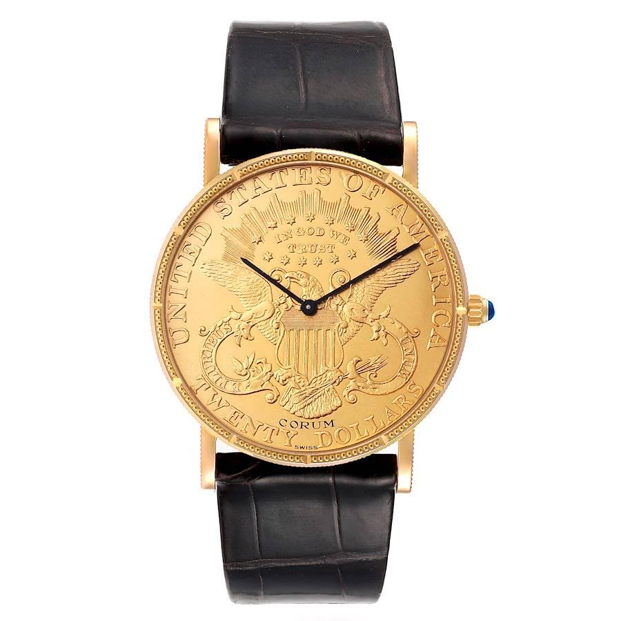 Corum 20 Dollars Double Eagle Yellow Gold Coin Mechanical Mens Watch 1904. Manual winding movement. 18k yellow gold case with 22k coin 36 mm in diameter. Coin edge. . Mineral glass crystal. 22K coin. Black baton hands. Brown leather strap with 18