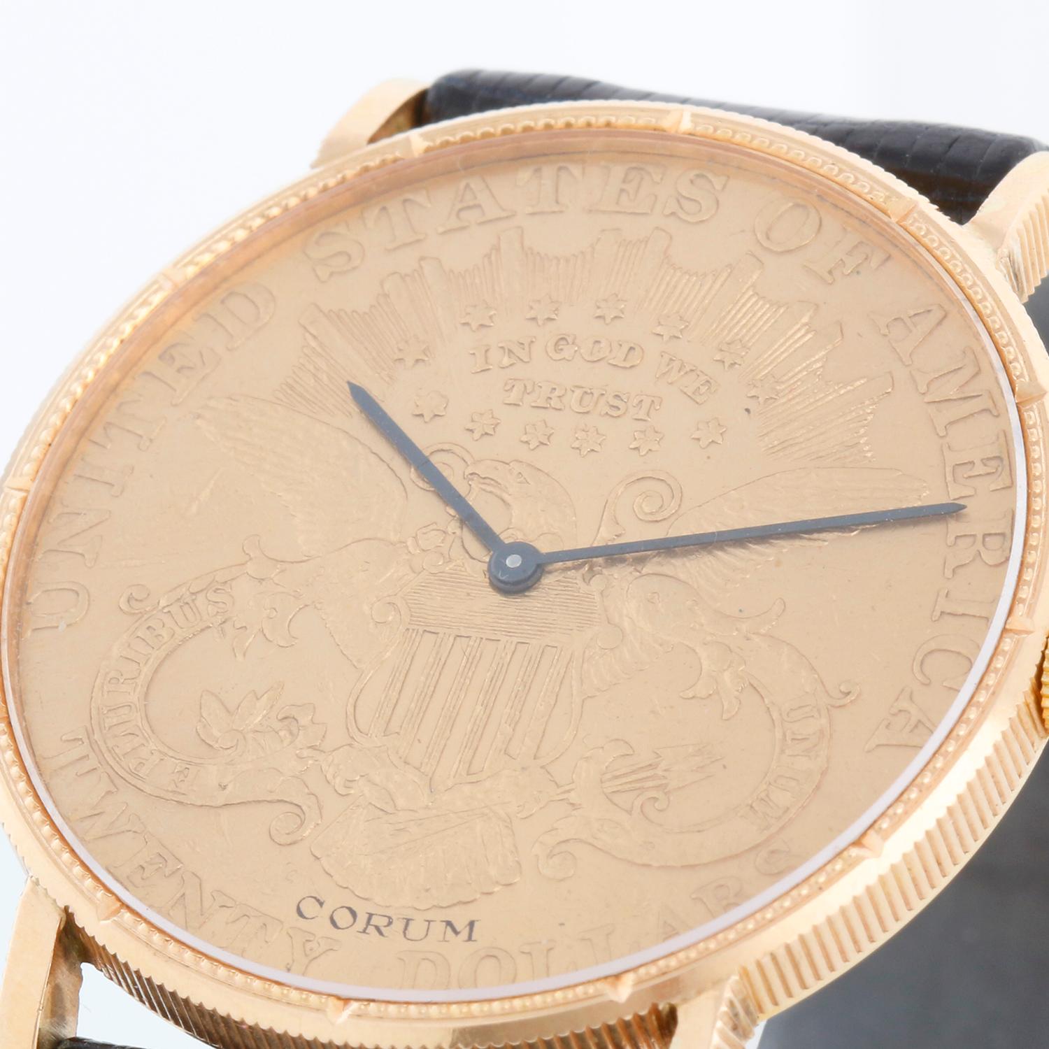 Corum $20 Liberty Gold Coin Men's 1904 Quartz Watch - Quartz movement. 22k yellow gold case with Liberty Double Eagle U.S. Twenty Dollar Liberty Coin (36mm diameter). 1904 U.S. $20 Liberty Gold Coin. Corum black strap and Corum buckle. Pre-owned