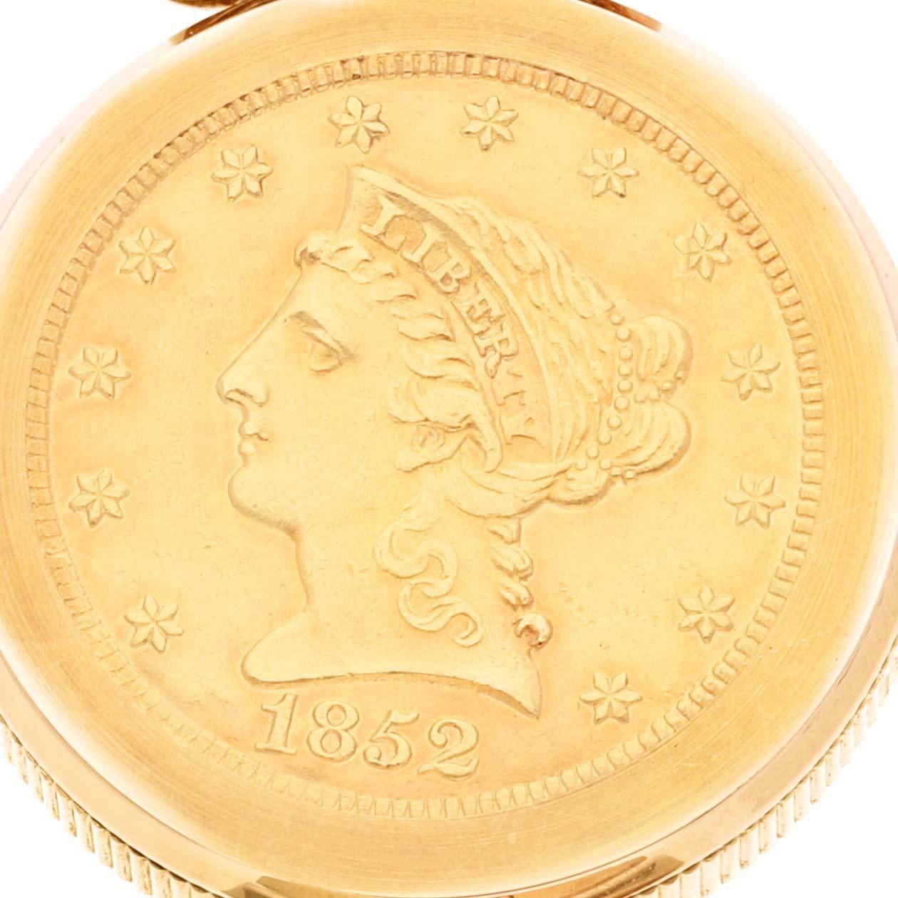 Corum 2.5 Dollars Eagle Liberty Coin Yellow Gold Ladies Watch 1852. Quartz. Boîtier en or jaune 18 carats avec une pièce en or jaune 18 carats de 21 mm de diamètre. Bord de la pièce. Couronne circulaire grainée sertie d'un diamant d'origine de la