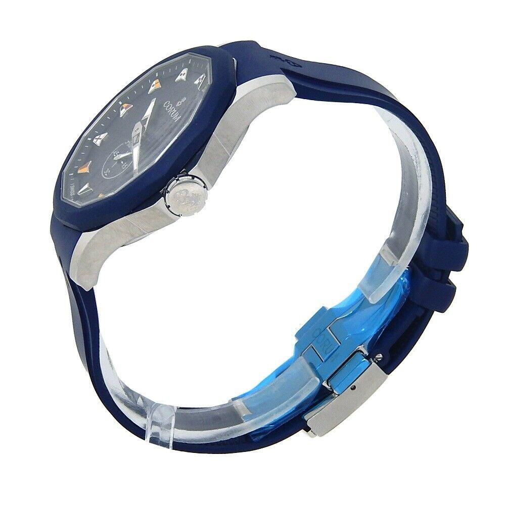 Brand: Corum
Band Color: Blue	
Gender:	Men's
Case Size: Not Specified	
MPN: Does Not Apply
Lug Width: 21mm	
Features:	Date Indicator, Luminous Hands, Sapphire Crystal, Skeleton Back, Swiss Made, Swiss Movement
Style: Casual	
Movement: Mechanical