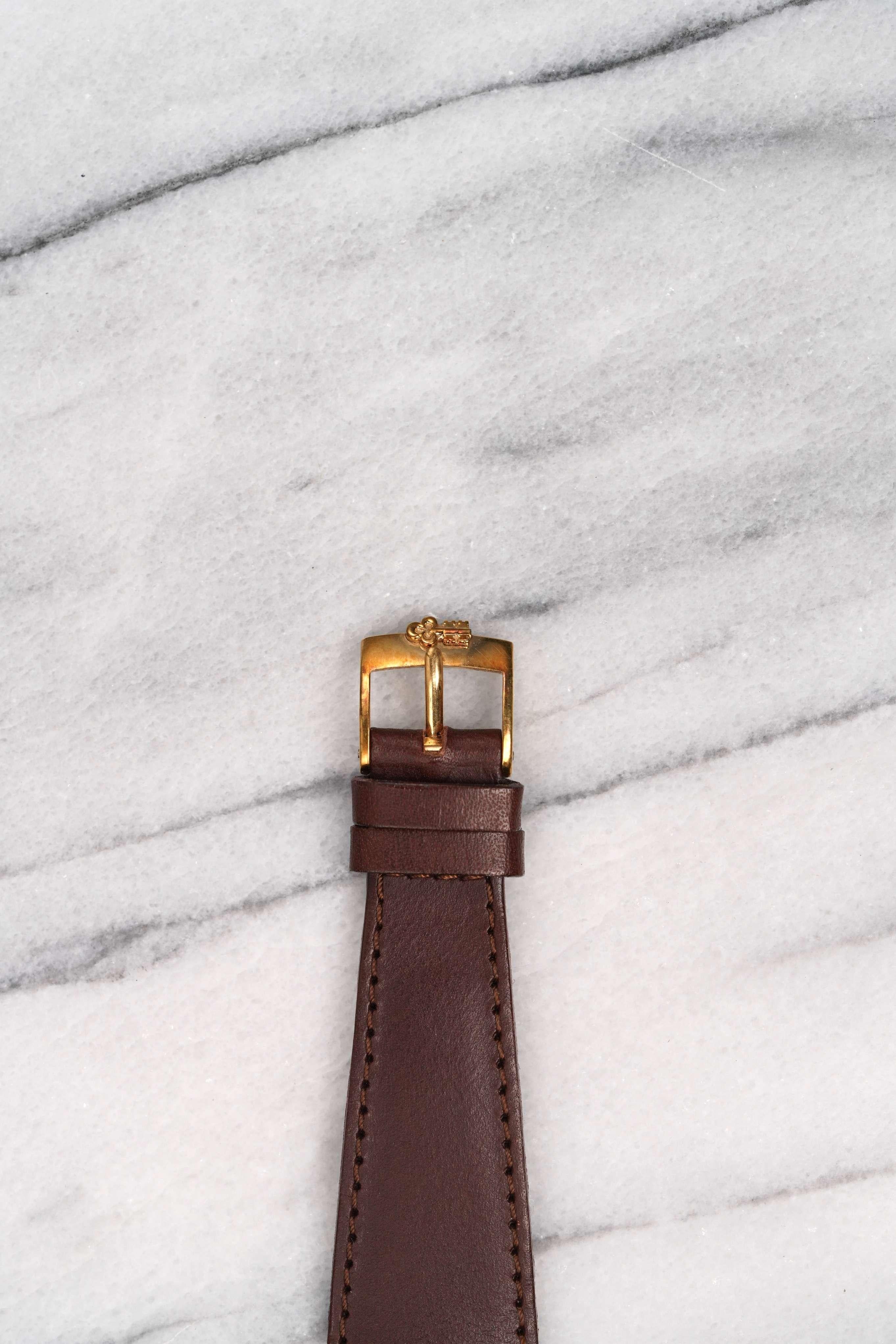 Corum Uhr mit braunem Zifferblatt aus 18K Gelbgold, 1970er Jahre im Zustand „Gut“ im Angebot in New York, NY