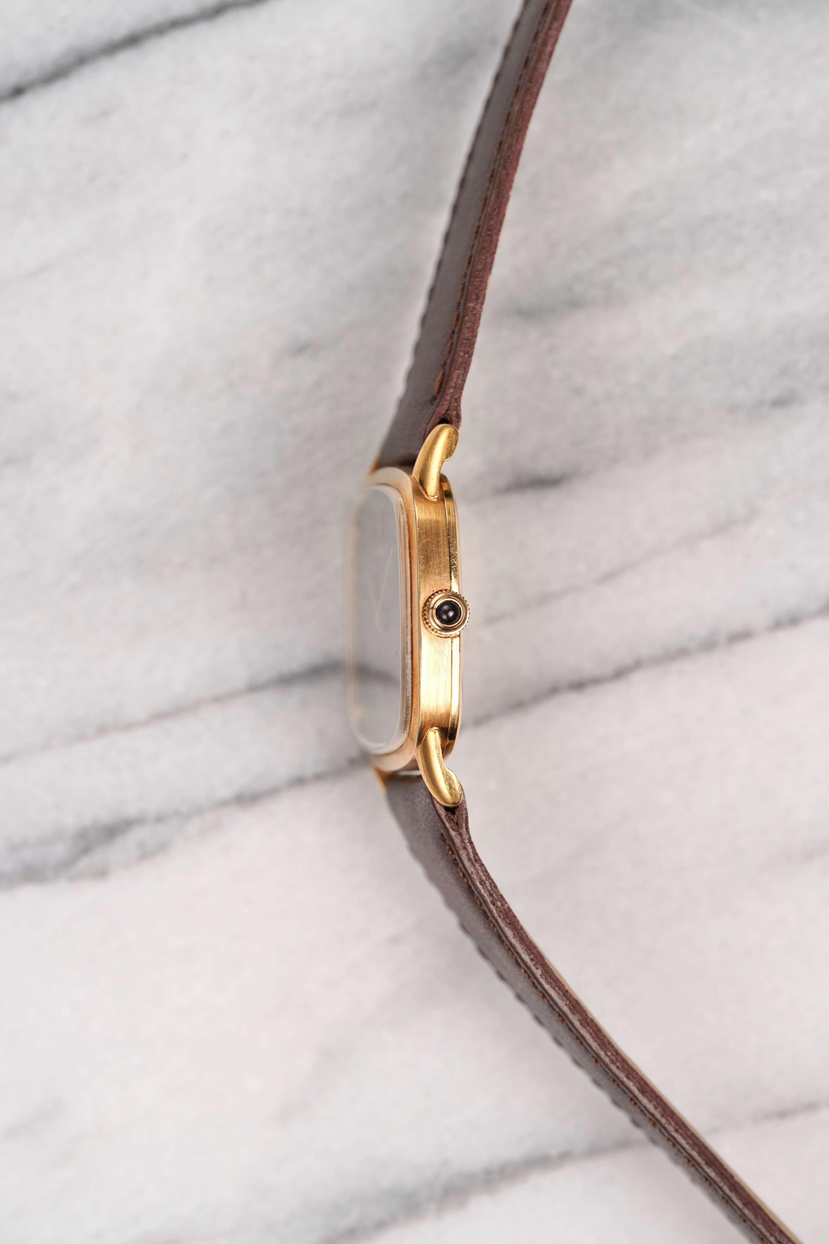 Corum Uhr mit braunem Zifferblatt aus 18K Gelbgold, 1970er Jahre Damen im Angebot