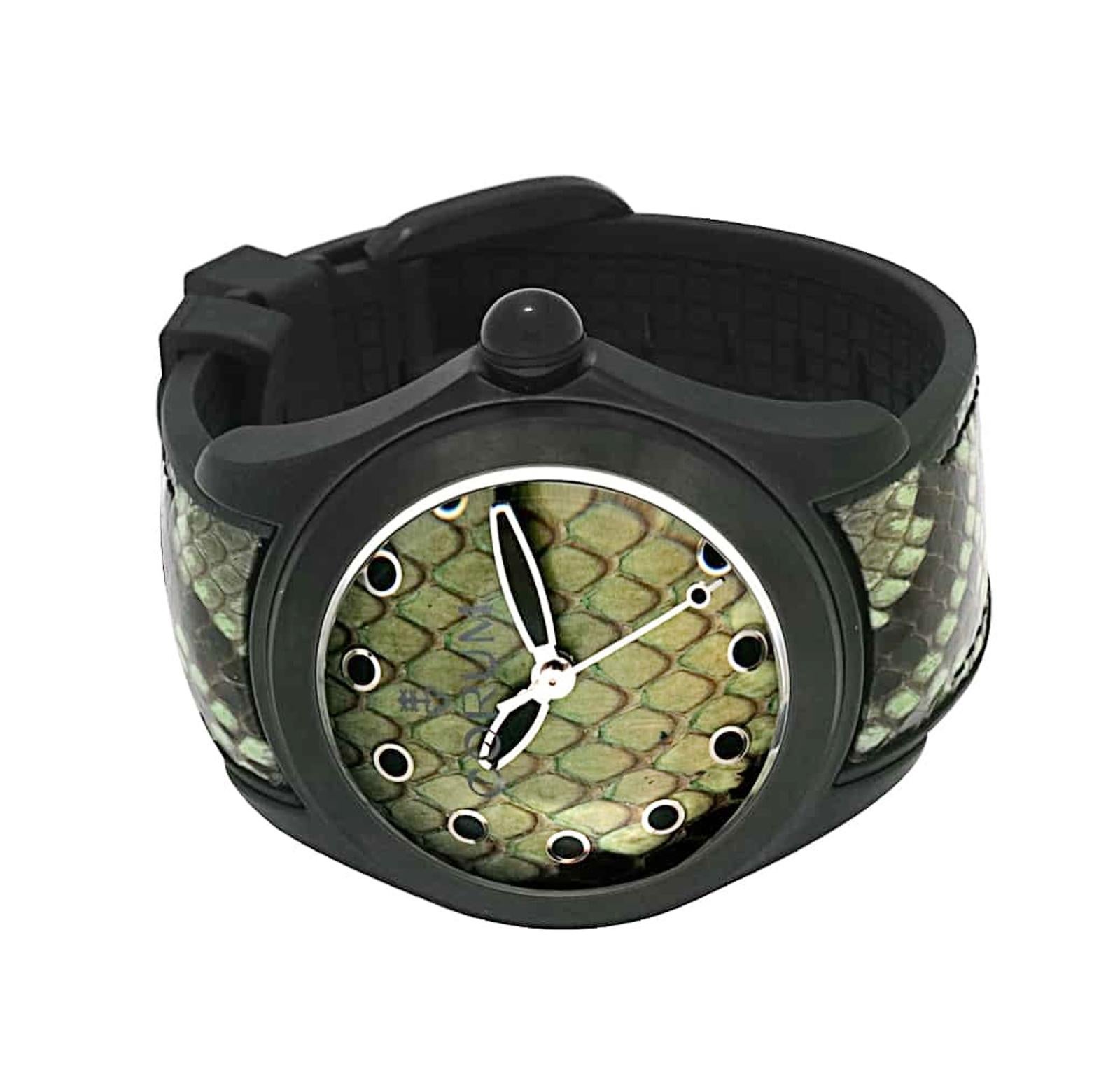 CORUM BUBBLE 42 PYTHON PVD COATED AUTOMATIC WATCH 082.410.98/0337 PV01

-Limited Edition
-New
-Case size: 42mm
-Movement: Automatic
-Stainless steel
-Case thickness: 17mm
-Scratch Resistant Sapphire
-Strap Color: Green
-Bezel: Fixed

*Comes with Box