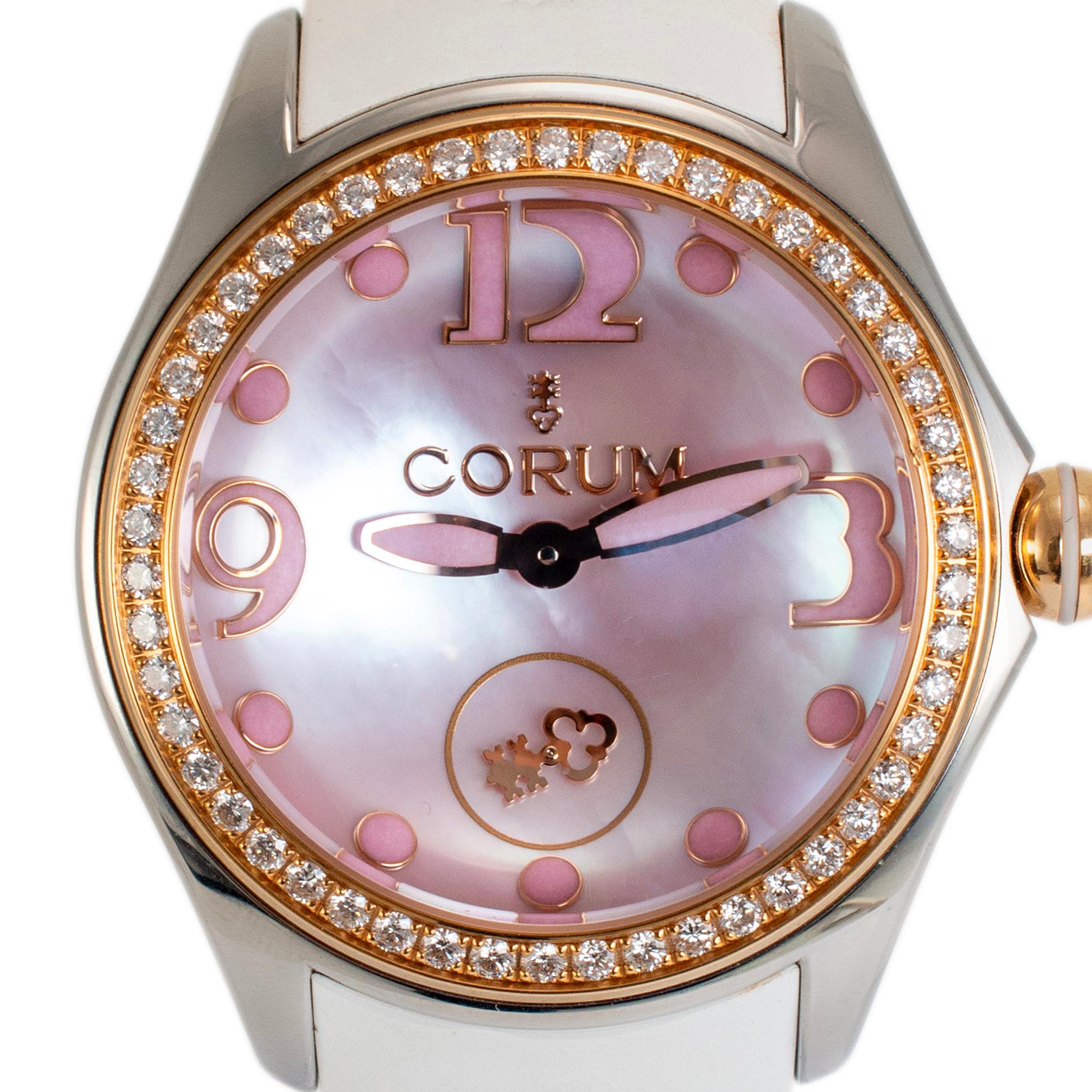 Brand: Corum

Gender: Ladies

Metal Type: Stainless Steel & 18K Rose Gold

Diameter: 42.00 mm

Weight: 120.88 grams

Stainless Steel and 18K Rose Gold diamond and mother of pearl CORUM Swiss made watch with original box and papers. The metals were