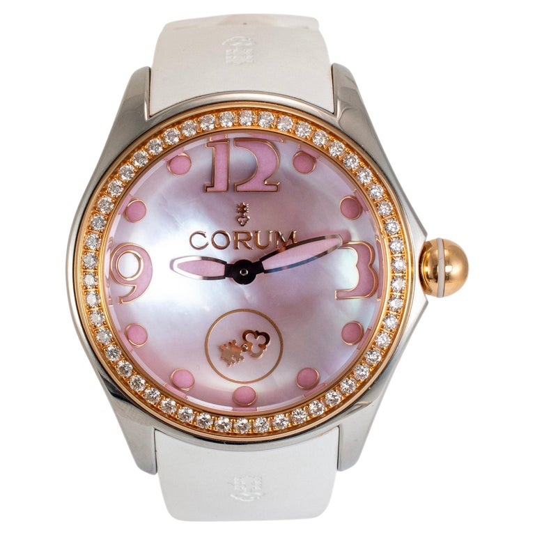 Montre Corum Bubble 42MM L295 rose avec lunette en or rose et