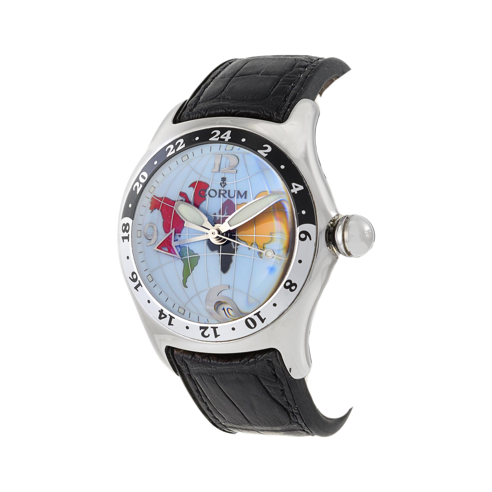The Corum Bubble GMT 383.250.20 is an automatic watch that embodies both elegance and functionality. Its features include a stainless steel case and bezel, with a diameter of 44mm and a distinct blue dial that showcases a global map motif,