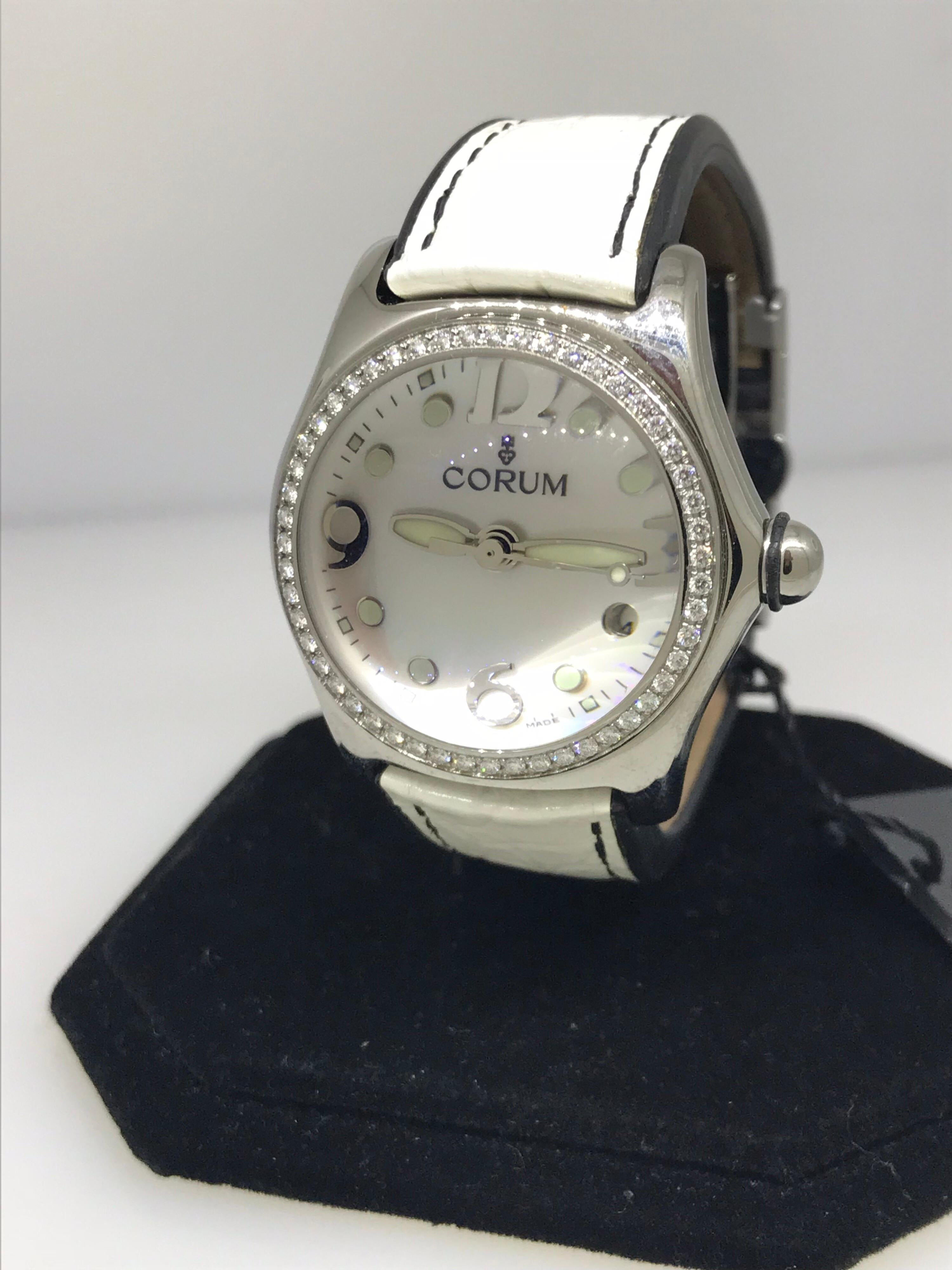 Corum Bubble Ladies Watch

Model Number: 3915147

100% Authentic

New / Old Stock

Comes with a generic watch box

Stainless Steel Case

Diamond Bezel

White Dial

Date Display at 3

White Leather Band

Deployment Buckle

Retails for $6,950


