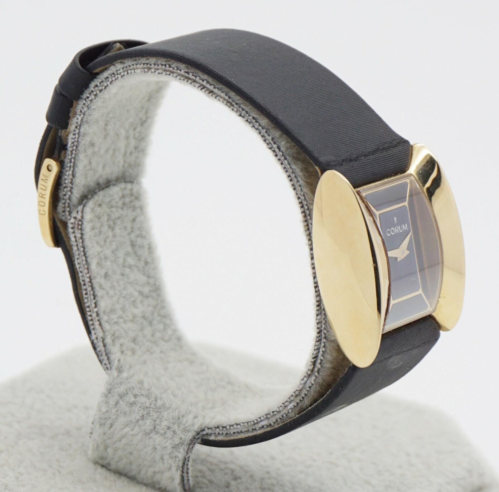 Priding themselves on exceptional watch making, Corum watches are known for their unique designs and commitment to craftsmanship. This beautifully functioning timepiece is crafted in solid 18k yellow gold, featuring the iconic key emblem, a symbol