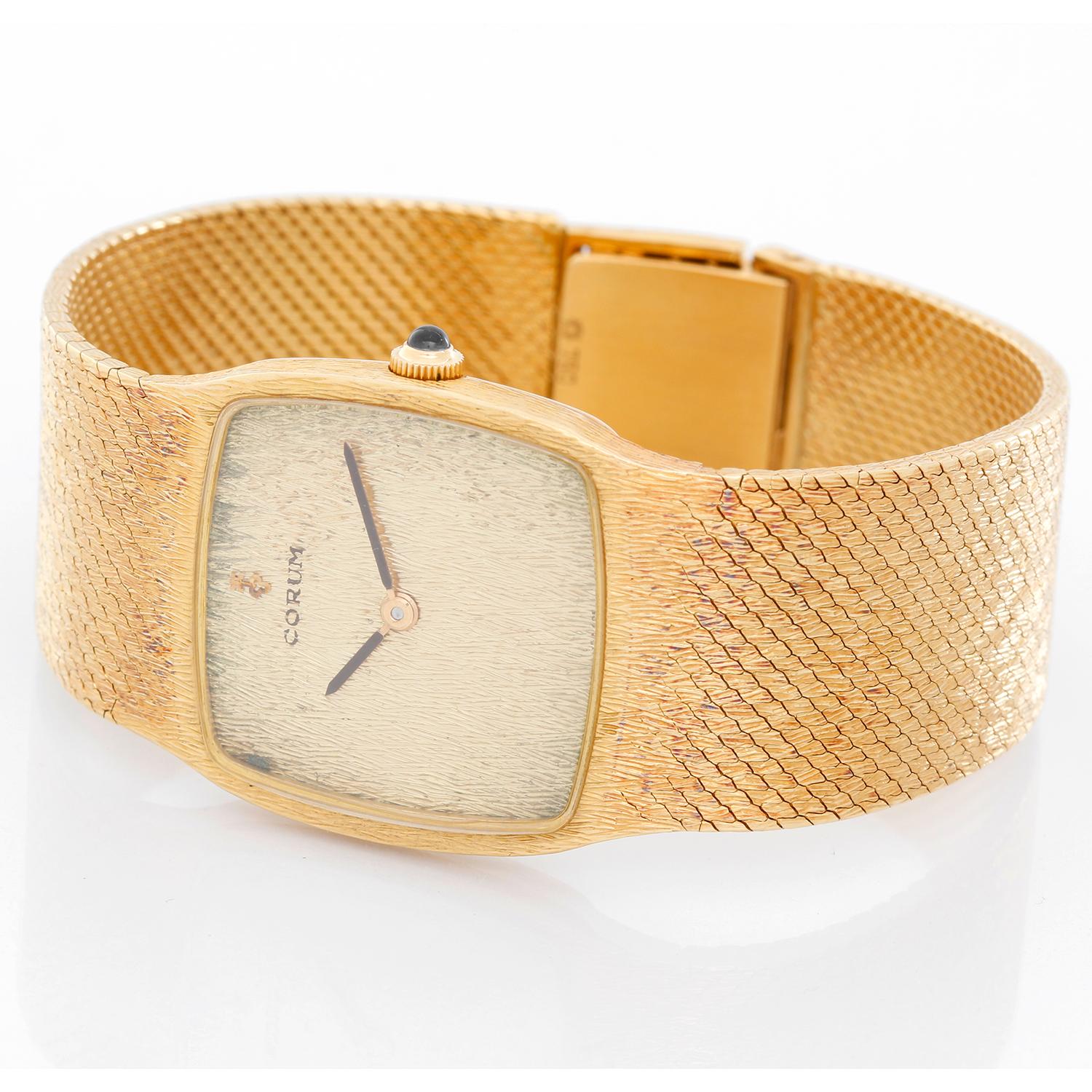 Corum Classique 18K Yellow Gold Watch - Manual. 18K yellow Gold ( 28 x 28 mm ). Textured champagne dial. 18K yellow gold mesh bracelet; will fit a 6.50 inch wrist. Pre-owned with custom box .
