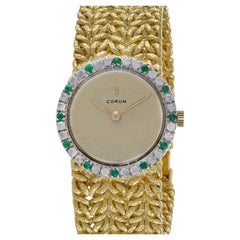 Montre cocktail Corum en or jaune 18 carats avec diamants et rubis