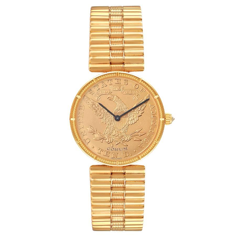 Corum Coin 10 Dollars Double Eagle Yellow Gold Ladies Watch 1901. Manual winding movement. 18k yellow gold case with 22k coin 28 mm in diameter. Coin edge. Circular grained crown set with diamond. . Mineral glass crystal. 22K coin. Black baton