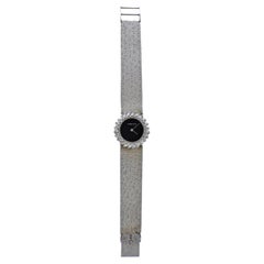 Corum Damenuhr aus Weißgold mit Diamanten