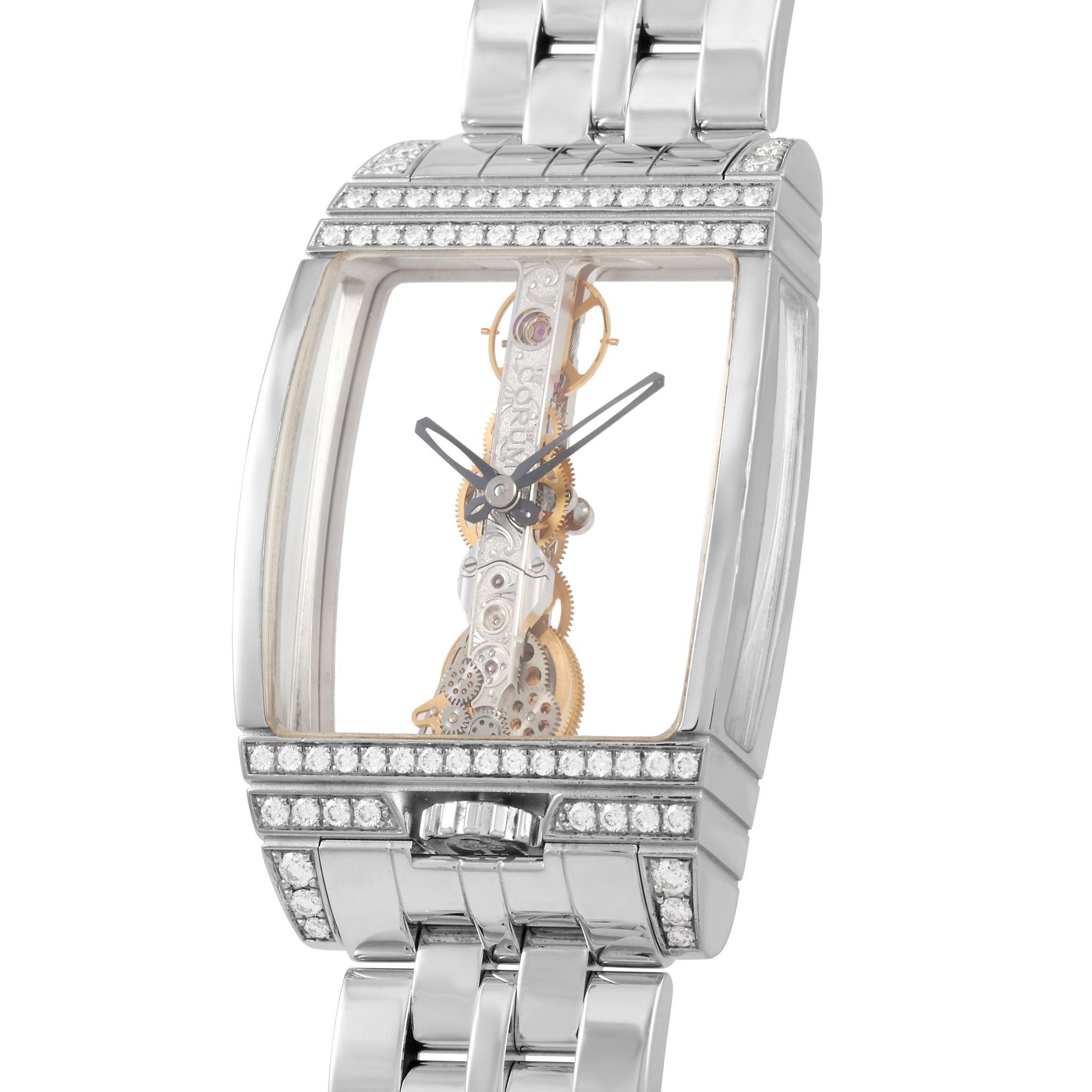 This Corum Golden Bridge 32 mm 18K White Gold 1.25 ct Diamond Watch, reference number 113.553.69.F, comes with an 18K White Gold case that measures 32 mm in diameter and is set with 1.25 carats of pave diamonds along the top and bottom. The case is