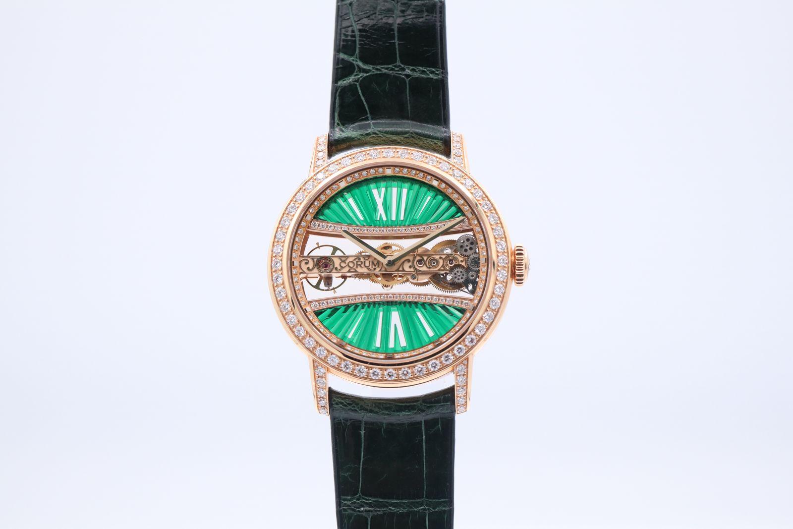 Corum Golden Bridge B113/03292 Emerald Dial Diamonds 18K Rose  Gold watch
For more details leave us a message

Model                  
Golden Bridge
Reference Number
B113/03292
Gender
Unisex
Metal
18K RG
Case Size
39 mm
Wrist Size
This watch will