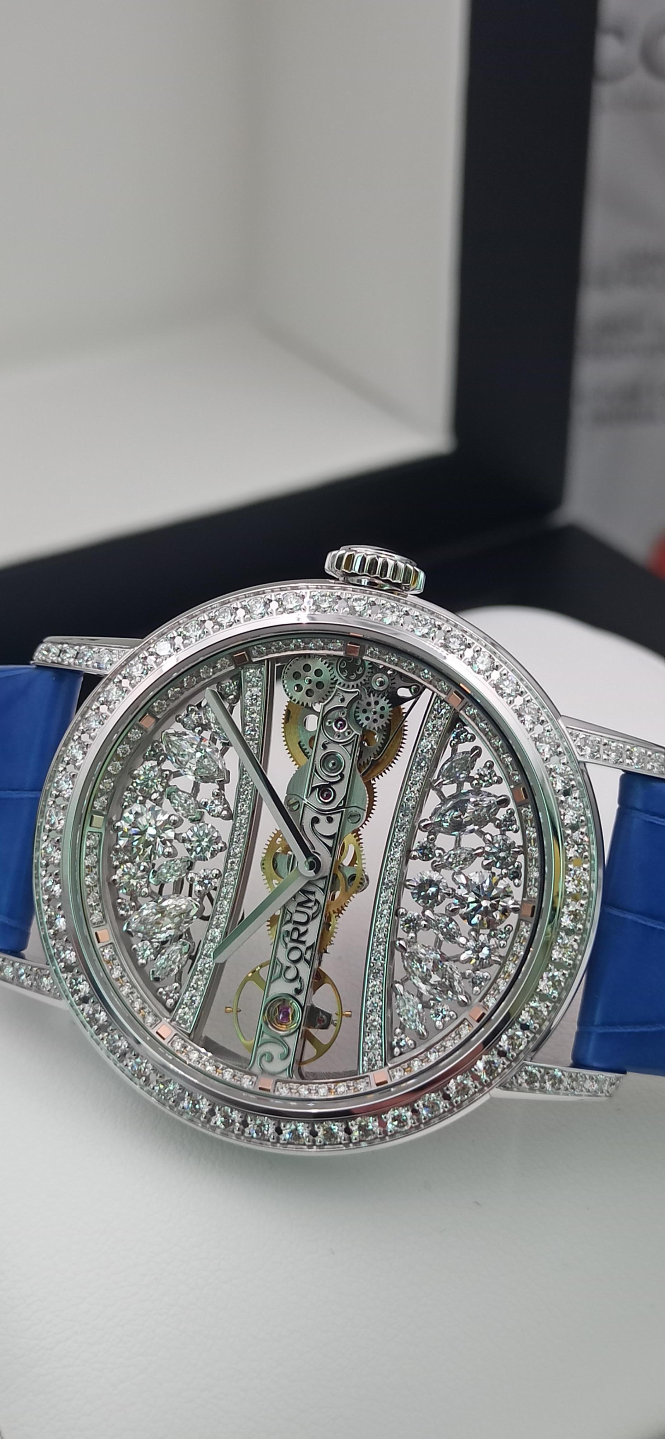Corum Golden Bridge, round 39mm case,  18kt white gold case and deployment buckle, 
complete with Box, Papers, Certificate.

Diamonds case, and amazing custom made in very few pieces from Corum master artisans, a special diamonds dial

Really an