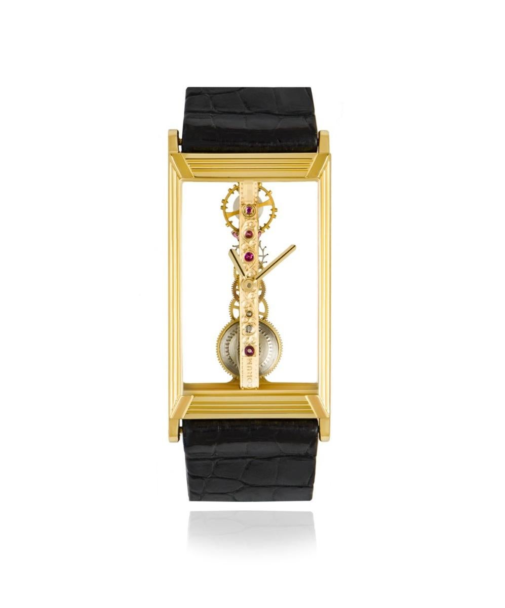 A stunning 20mm Vintage Golden Bridge wristwatch crafted in yellow gold by Corum. Featuring a distinctively unique skeleton dial synonymous with the Corum Golden bridge and a fixed yellow gold bezel. Fitted with a plastic glass and a manual winding