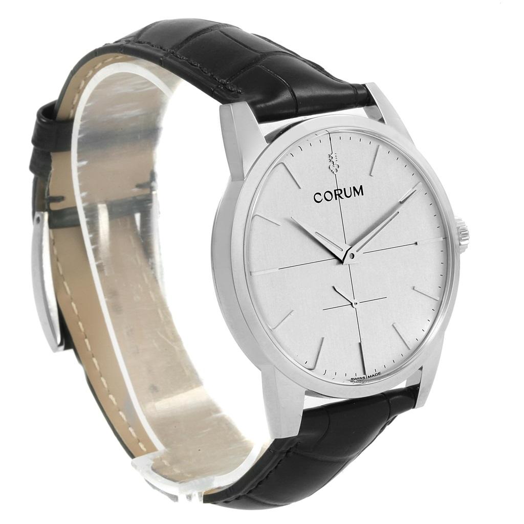 Corum Heritage 38mm Silver Dial Steel Mens Watch V157/02614. Manual-winding movement. Stainless steel case 38.0 mm in diameter. Exhibition sapphire crystal caseback. Fixed stainless steel bezel. Scratch resistant sapphire crystal. Silver dial with