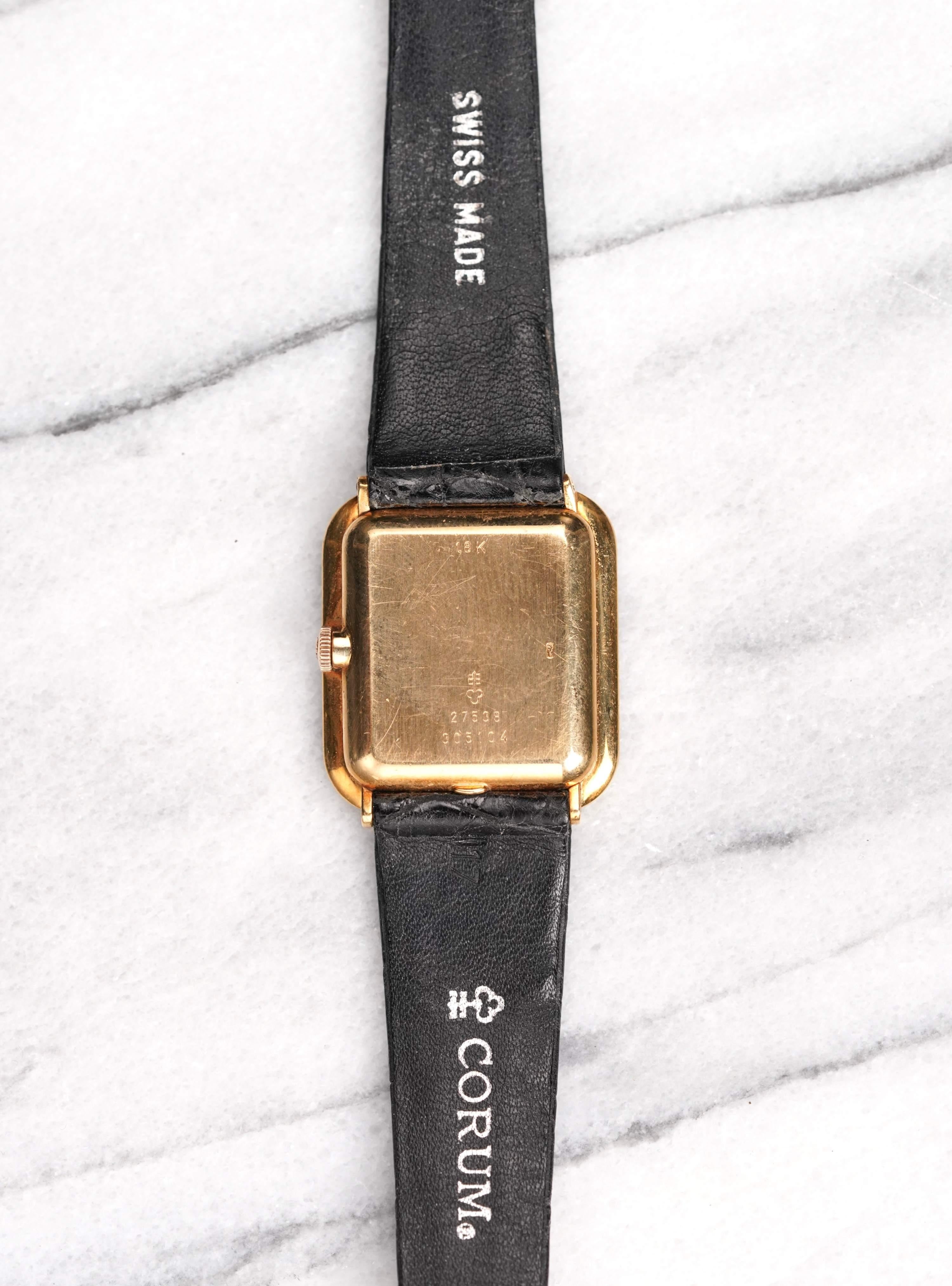 Here's a vintage Corum manual wind tank in 18k yellow gold with an onyx dial with diamonds from the 1980s. Keeps great time and is fully functional. Measurements include a 30mmm case and an 18mm lug width. On its original leather strap and signed