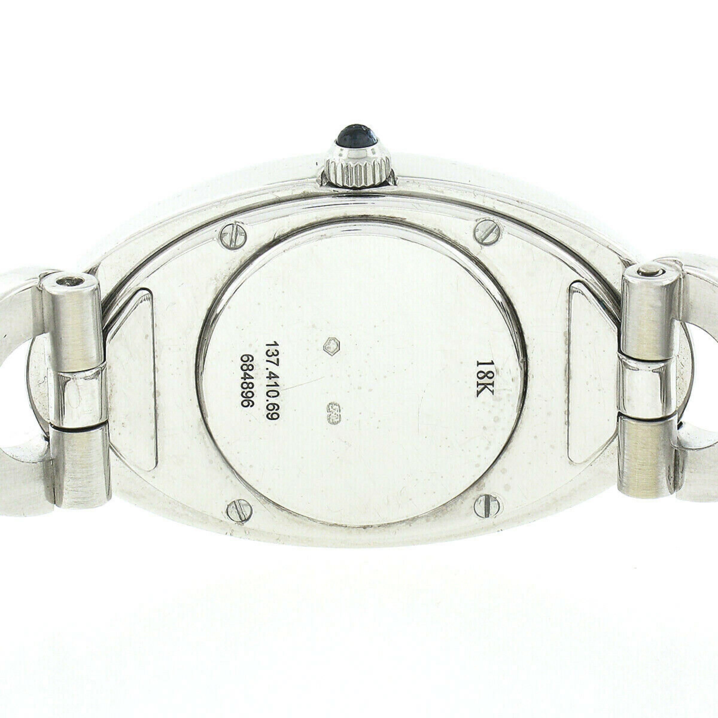 Women's Corum Ovale 18k White Gold Pink MoP Dial Quartz Wrist Watch 137.410.69 For Sale