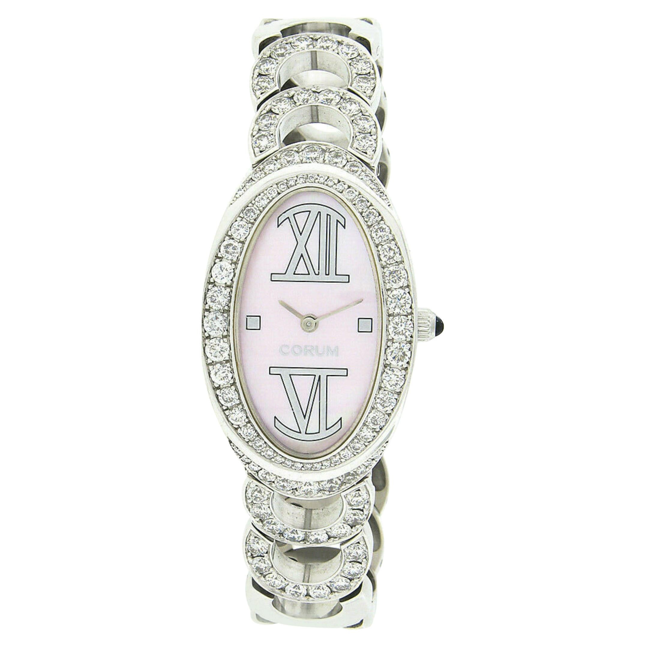 Montre-bracelet Corum ovale en or blanc 18 carats avec cadran MoP rose et quartz 137.410.69