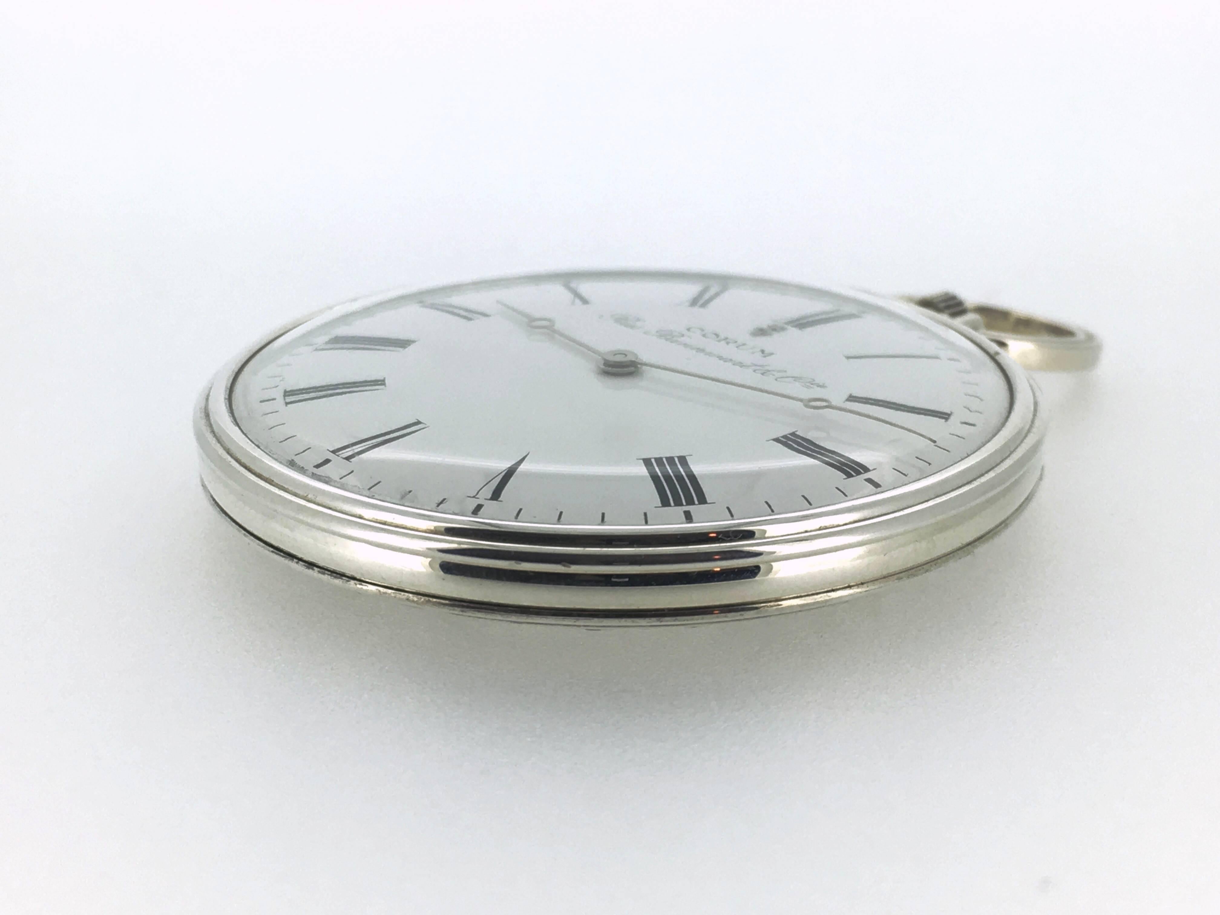 silver mechanical pocket watch