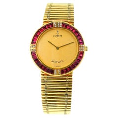 Corum Romulus 18K Yellow Gold Ruby Bag Bezel Reeded Link Bracelet
