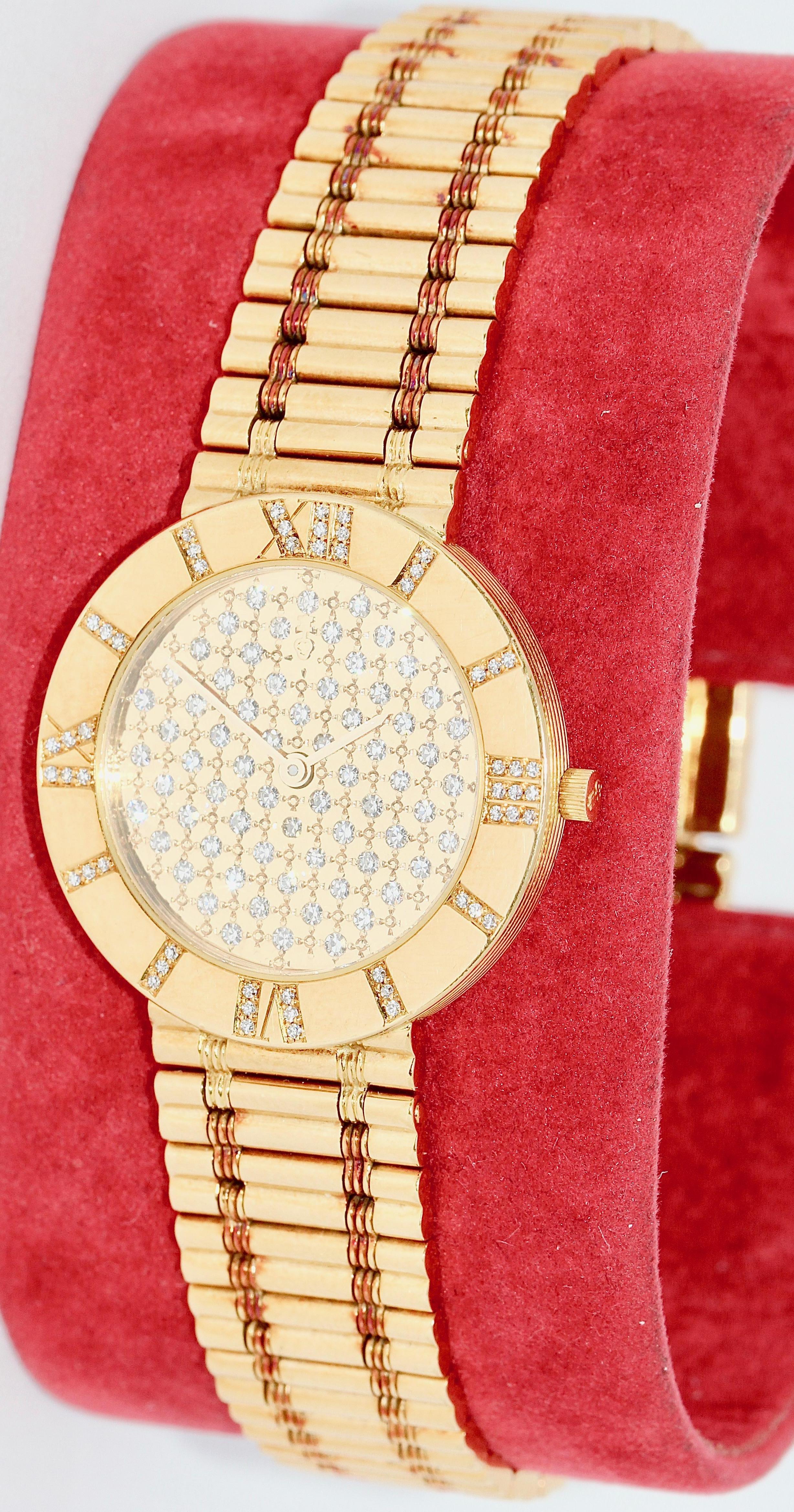 Corum Romvlvs Romulus Ladies Wrist Watch, 18 Karat Gold and Diamonds.

Rare model with diamond-dial and -bezel.
Including certificate of authenticity, box and papers.

The watch will be overhauled before shipment! (New battery etc.)