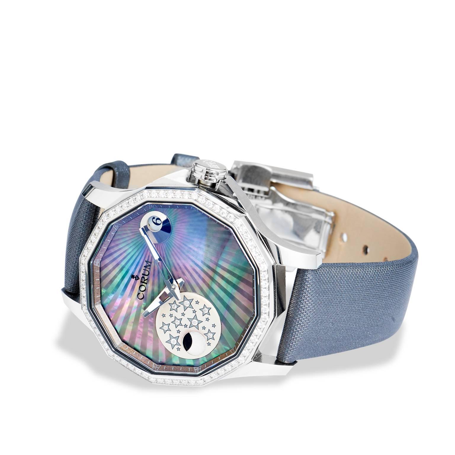 Corum Edelstahl Diamant Lünette Mystery Moon Armbanduhr

Brandneue Admirals Legende Corum Uhr verfügt über eine 38 mm Geheimnis Mond Zifferblatt mit Diamant-Lünette und schwarzem MOP-Zifferblatt. Die Uhr wird mit einem grauen Armband geliefert. 