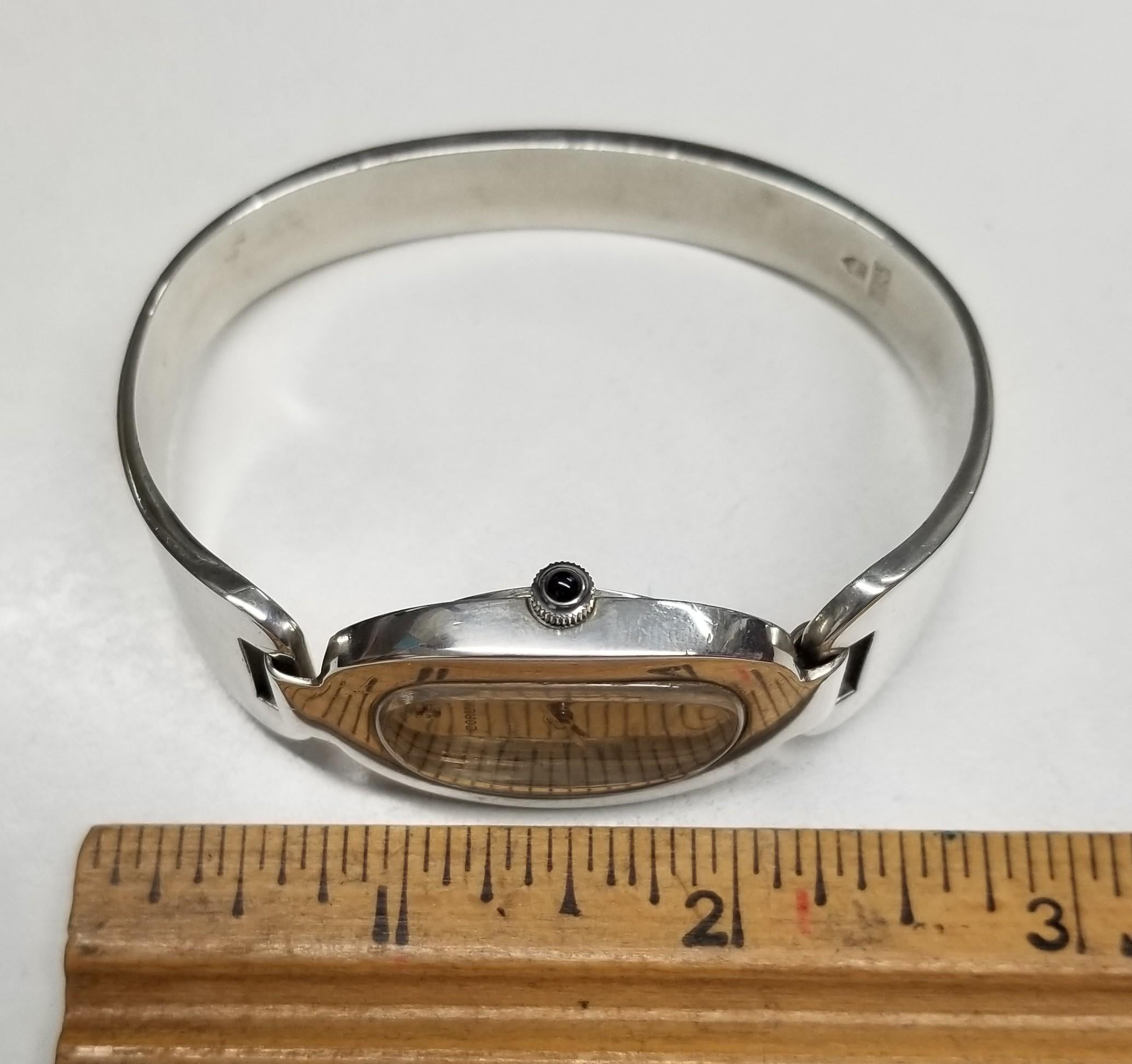 Reloj manual estilo puño Corum de plata de ley, años 70 en venta 1