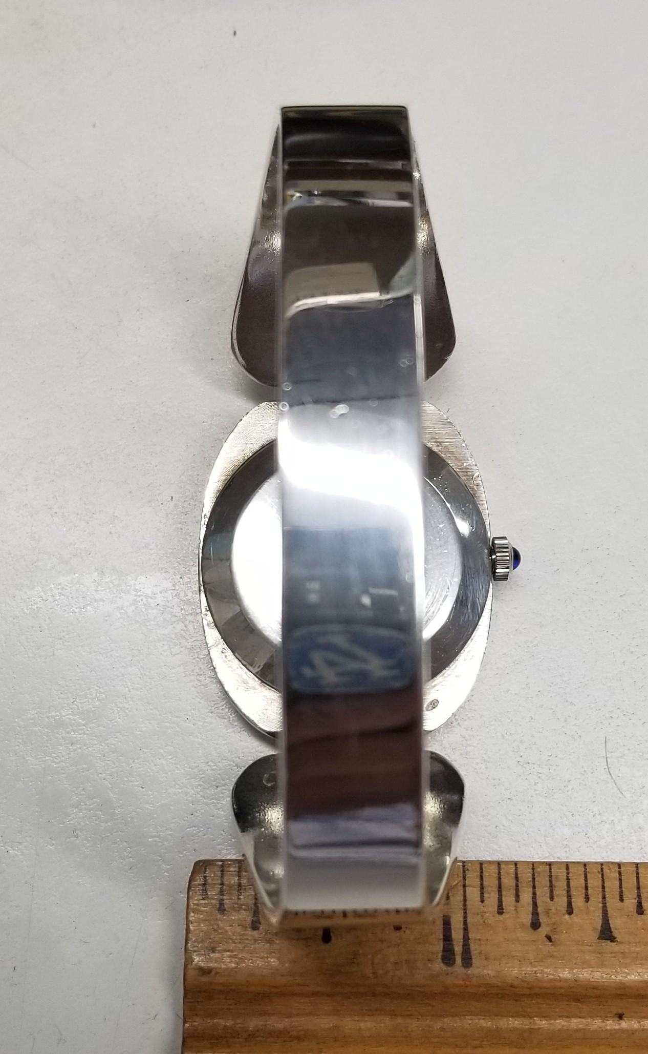 Reloj manual estilo puño Corum de plata de ley, años 70 en venta 2