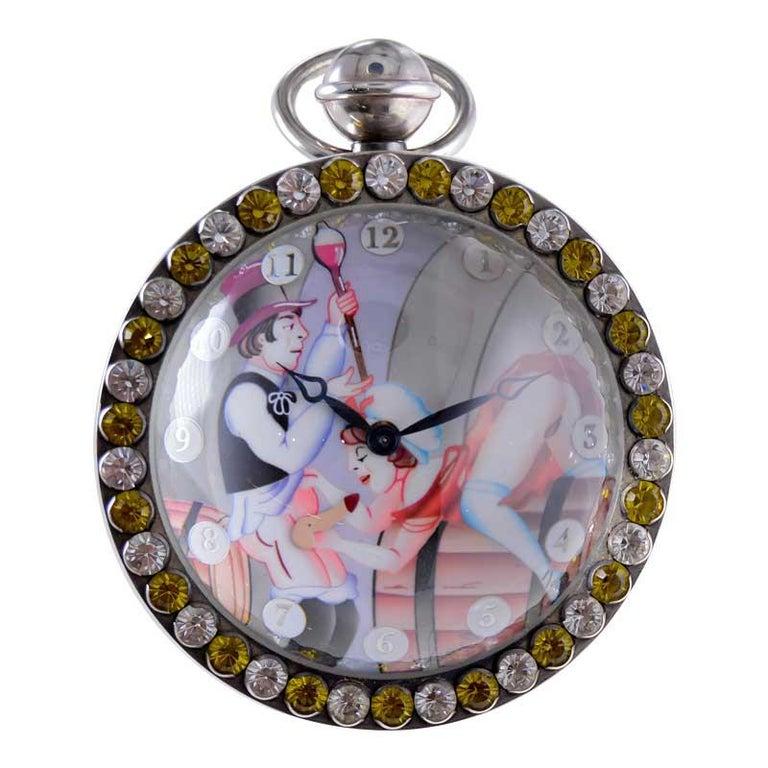 FACTORY / HOUSE: Corum Watch Company
STYLE / REFERENCE: Erotic Ball Desk Clock
METAL / MATERIAL: Sterling Silver and Semi Precious Stones
CIRCA / YEAR: 1990's
DIMENSIONS / SIZE: 3 Inches X 3 Inches diameter
MOVEMENT / CALIBER: Manual Winding /