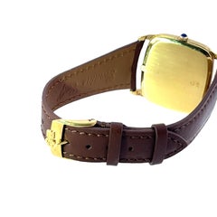 Reloj Corum Vintage Tank – Oro amarillo de 18 quilates, esfera marrón con efecto rayos de sol