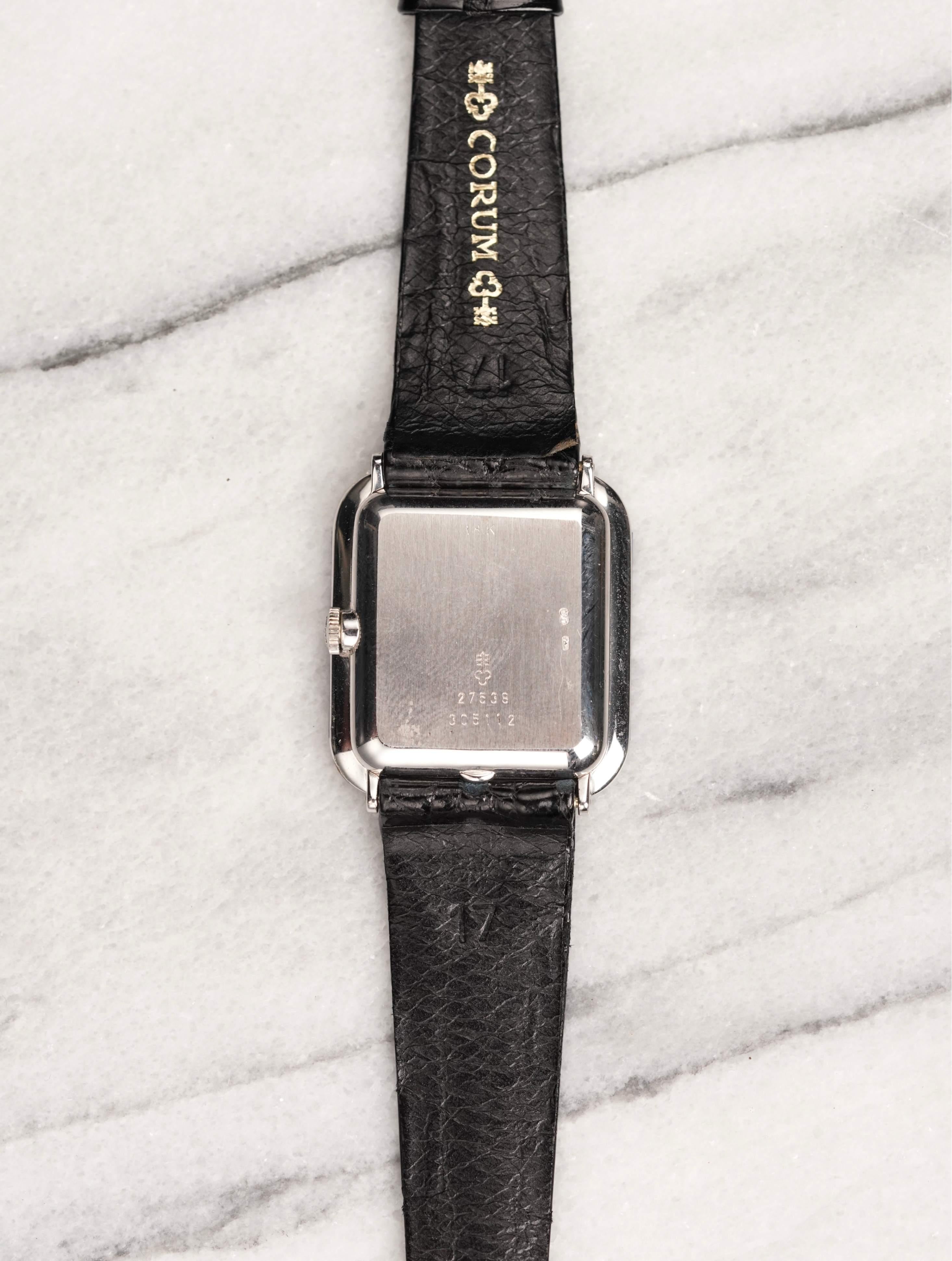 Here's a vintage Corum manual wind tank in 18k white gold with a mother of peal dial with diamonds from the 1980s. Keeps great time and is fully functional. Measurements include a 30mmm case and an 18mm lug width. On its original leather strap and
