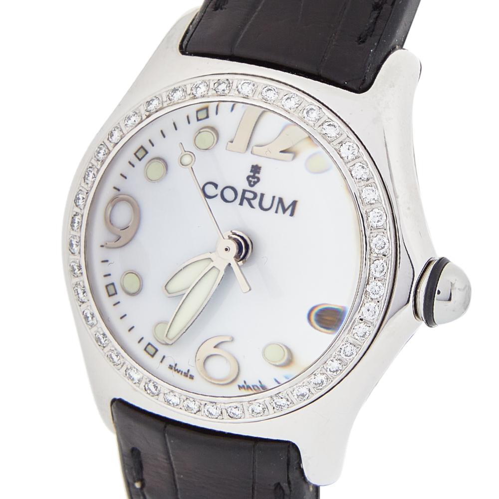 The Bubble 39.250.20 watch is a style you will love to flaunt every day. From the House of Corum, the stainless steel creation comes with a diamond-studded bezel and a white dial. Distinct markers, three hands, and a date window adorn the dial. The