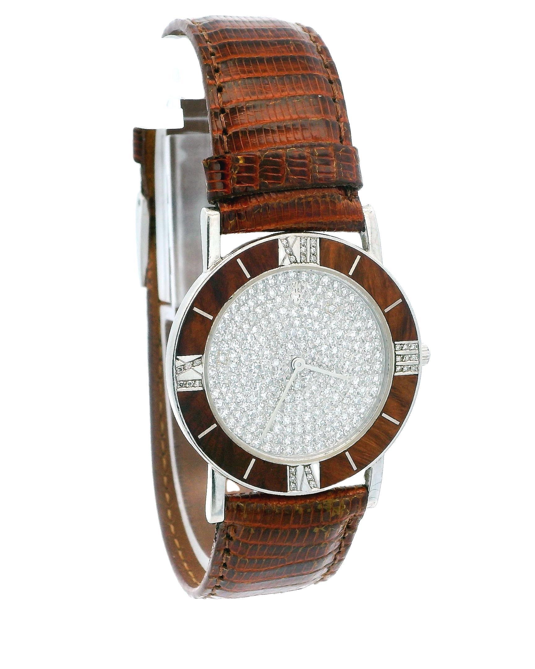 Discover the elegance of this Corum watch, meticulously crafted in Switzerland. It features a round shape and precise quartz movement, offering both style and reliability. The 31mm dial showcases a captivating diamond pattern, encased in platinum