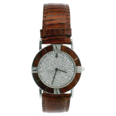 Orologio Corum Wood Roman con lunetta di diamanti e quadrante in platino con pave