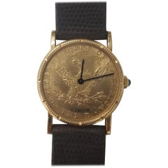 Corum Damenuhr aus Gelbgold mit 10 Dollar Münze und Diamanten Jahr 1902