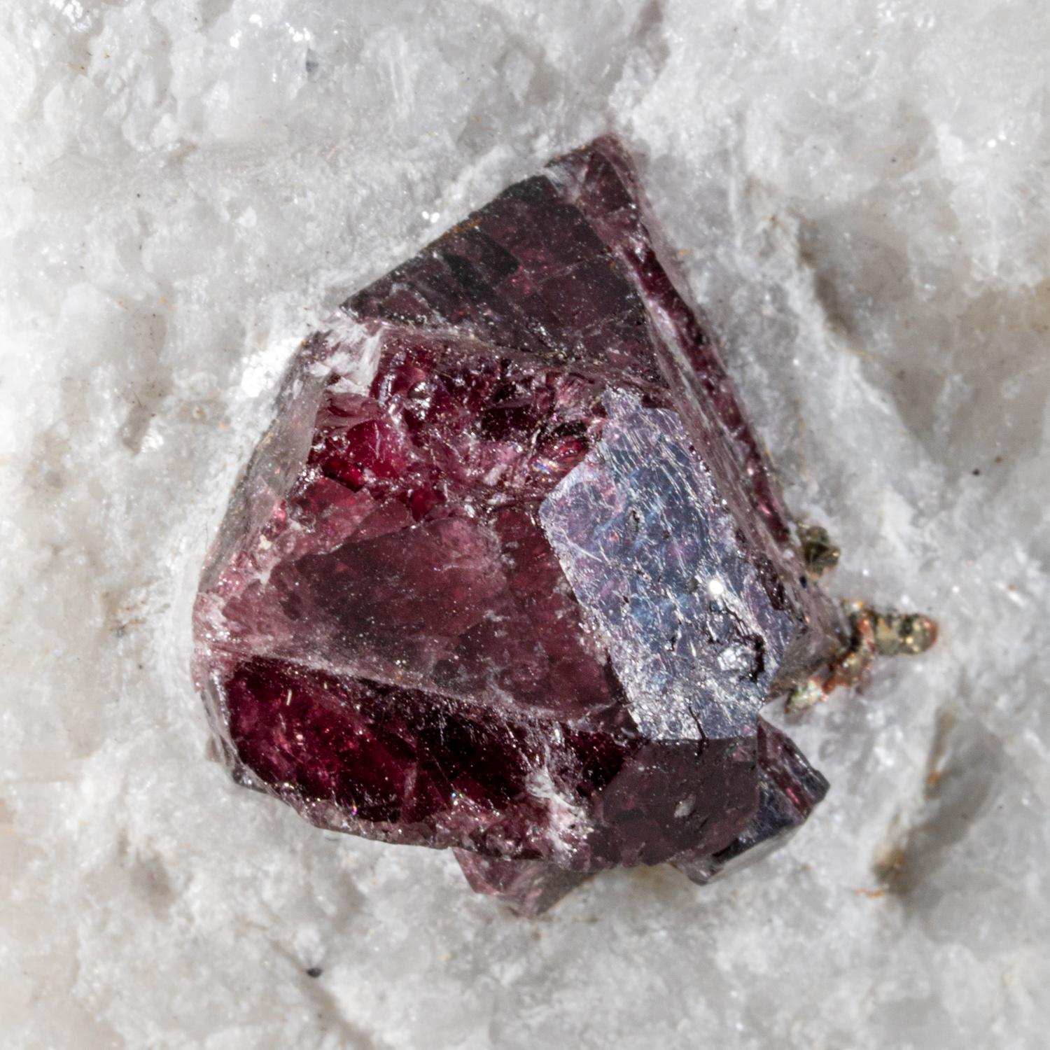 From Mysuru (formerly Mysore), Karnataka, India.

Exquisite, several translucent deep-pink ruby crystals, the pink gem variety of the mineral species corundum, well exposed on quartz matrix. The ruby crystal have irregular mottled surfaces, bright