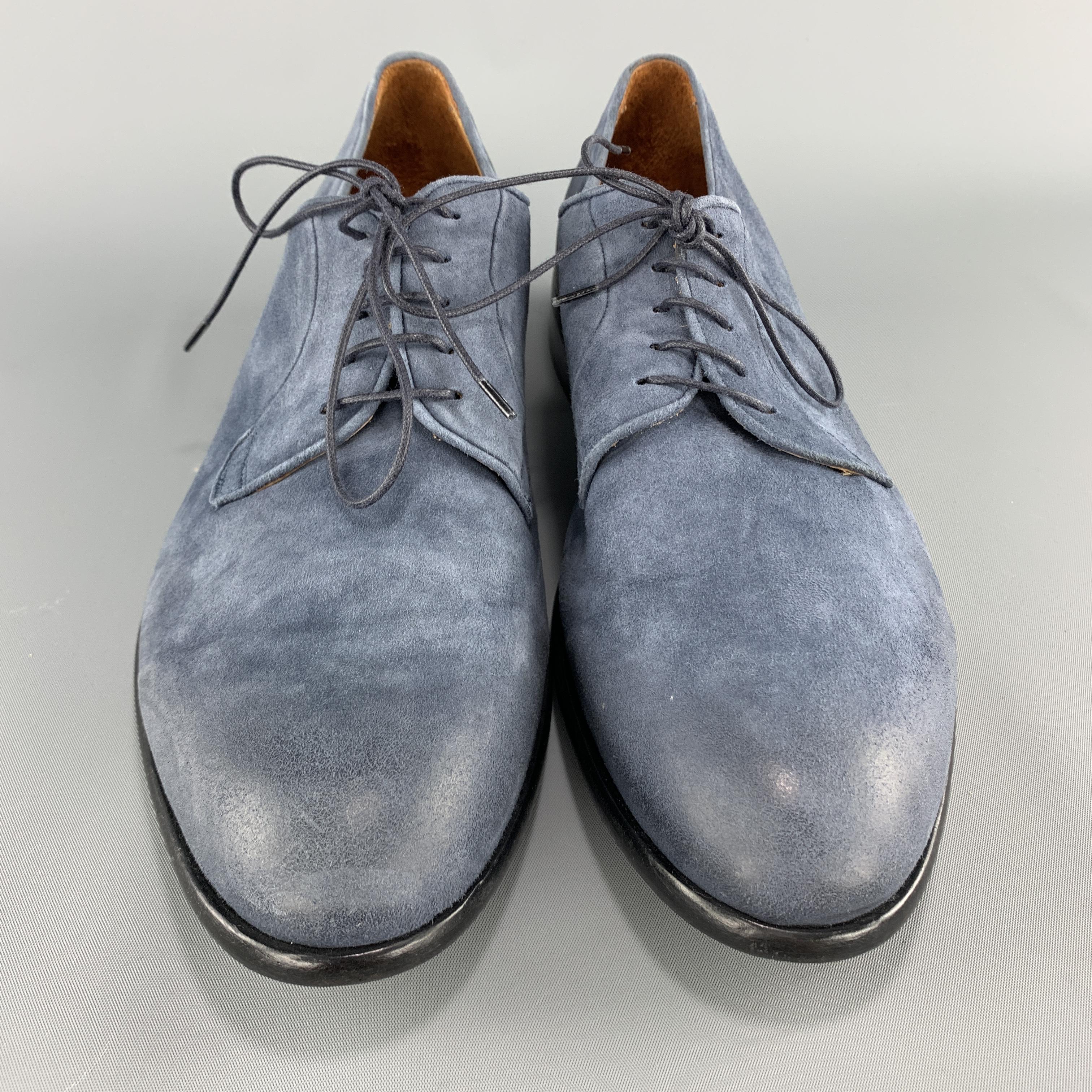 CORVARI dress shoes come in antique effect distressed denim blue suede with a black sole and lace up front. Handmade in Italy.

Very Good Pre-Owned Condition.
Marked: IT 43.5

Outsole: 12 x 4 in.