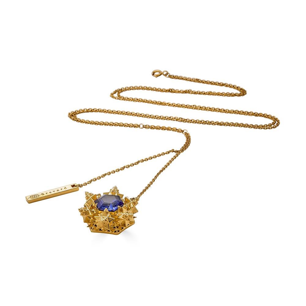 ADD TO CART
This limited edition, Cosmic Creation Pendant Necklace is inspired by patterns in the cosmos. Using the Thoscene platform developed by John Brevard, this 18K gold and created sapphire piece is designed based on astrological systems and