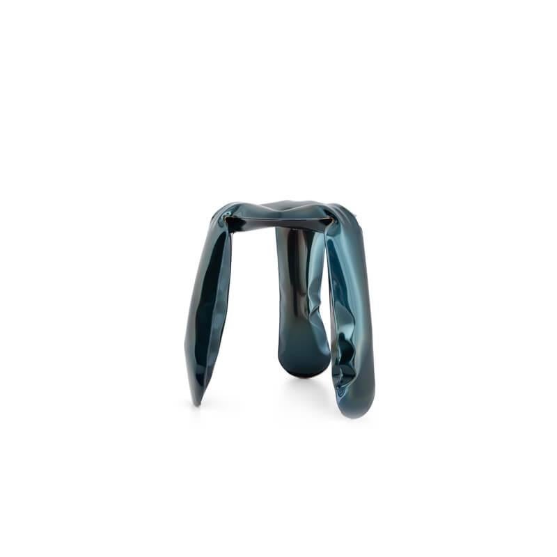 Cosmic blue mini plopp stool by Zieta
Dimensions: Diameter 25 x H 38 cm 
Material: Stainless steel, carbon Steel. 
Finish: Thermal colored. Cosmic Blue.
Available in colors: Flamed Gold and Cosmic Blue. Available in stainless steel, aluminum,