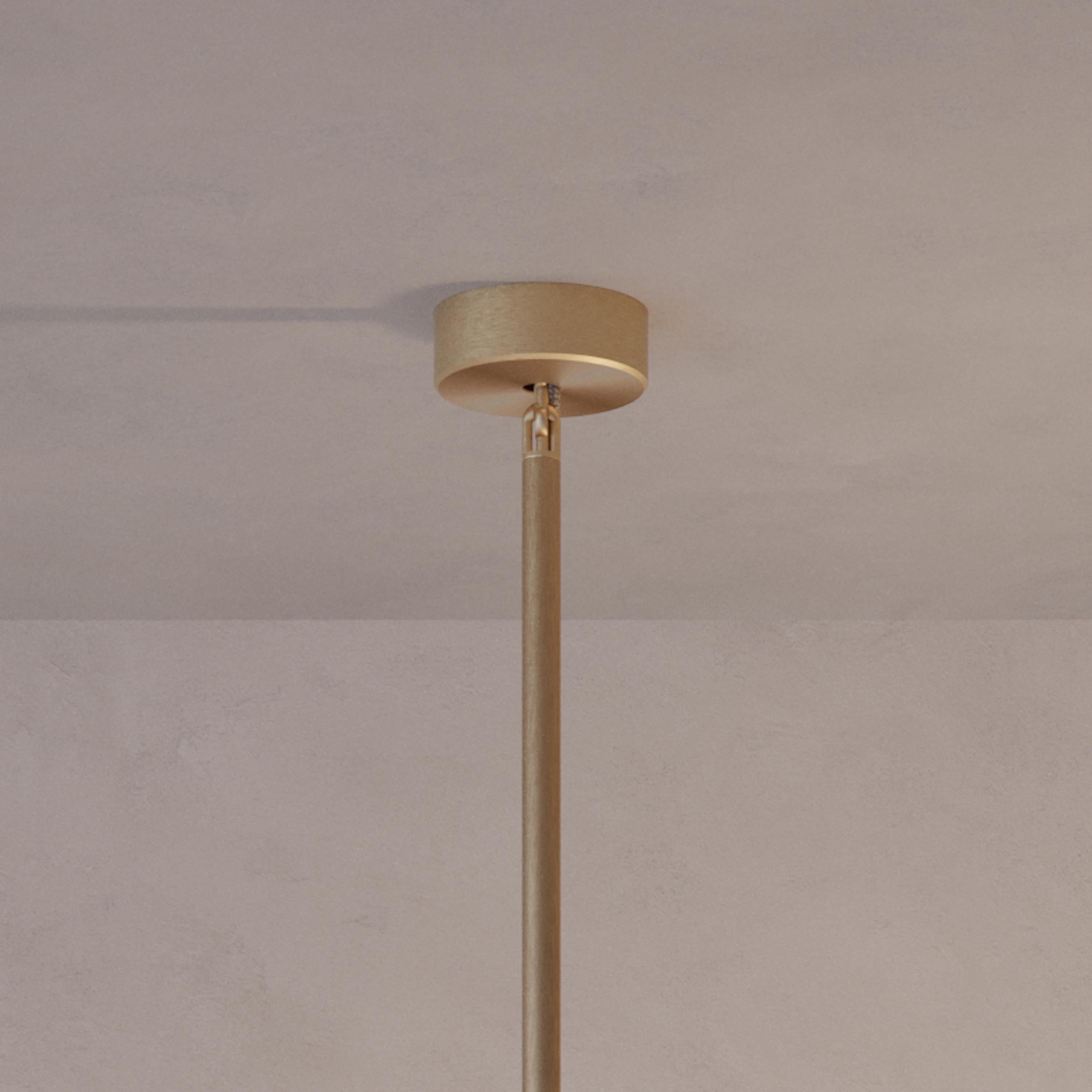 Two lighting components harmoniously balanced, framing this unique ceiling light. Composed by patinated brass plates and finely brushed brass framework, the Orbit Solo ceiling light is softly illuminated with LED elements from within.
 
This