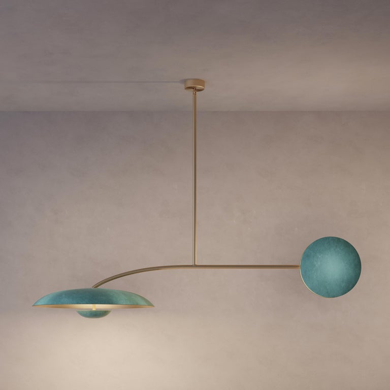 Two lighting components harmoniously balanced, framing this unique ceiling light. Composed by patinated brass plates and finely brushed satin framework, the Orbit Solo ceiling light is softly illuminated with LED elements from within.
 
This