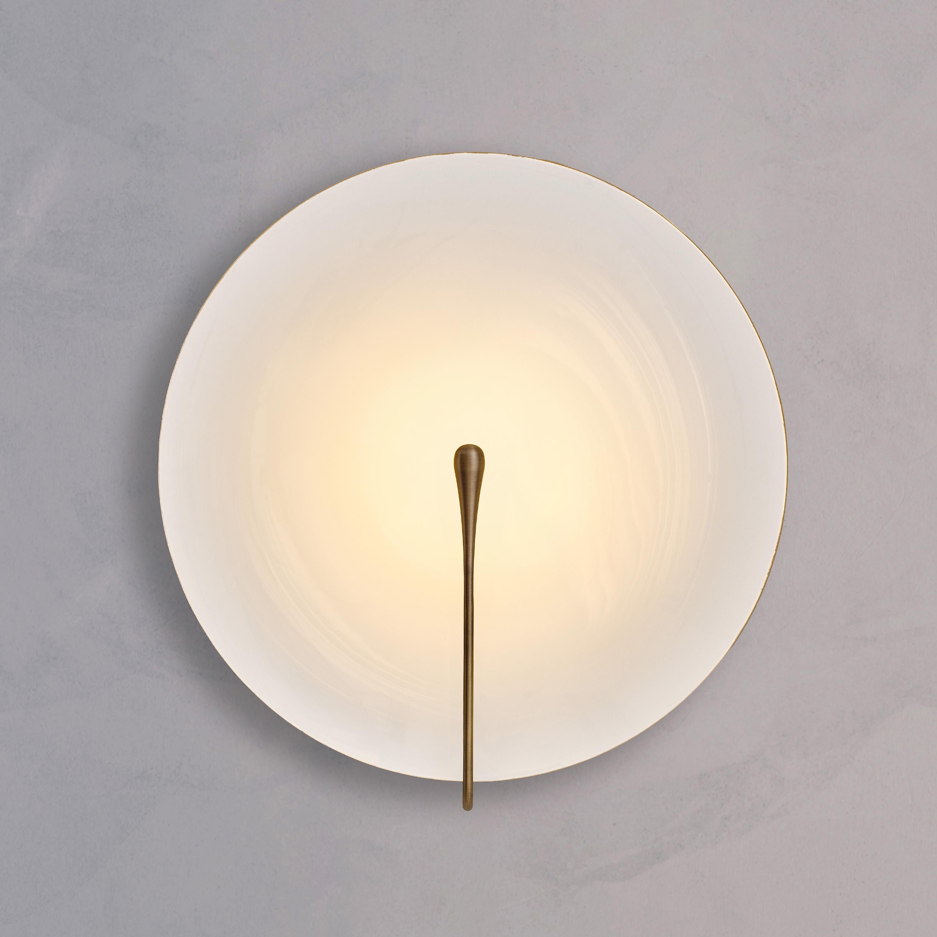 Inspired by the beautiful textures of nature, The rim and the back of the shade are finished in satin brass, whilst the inner surface is hand-lacquered in a gloss or matt white finish. Please note that each piece is individually handmade, therefore
