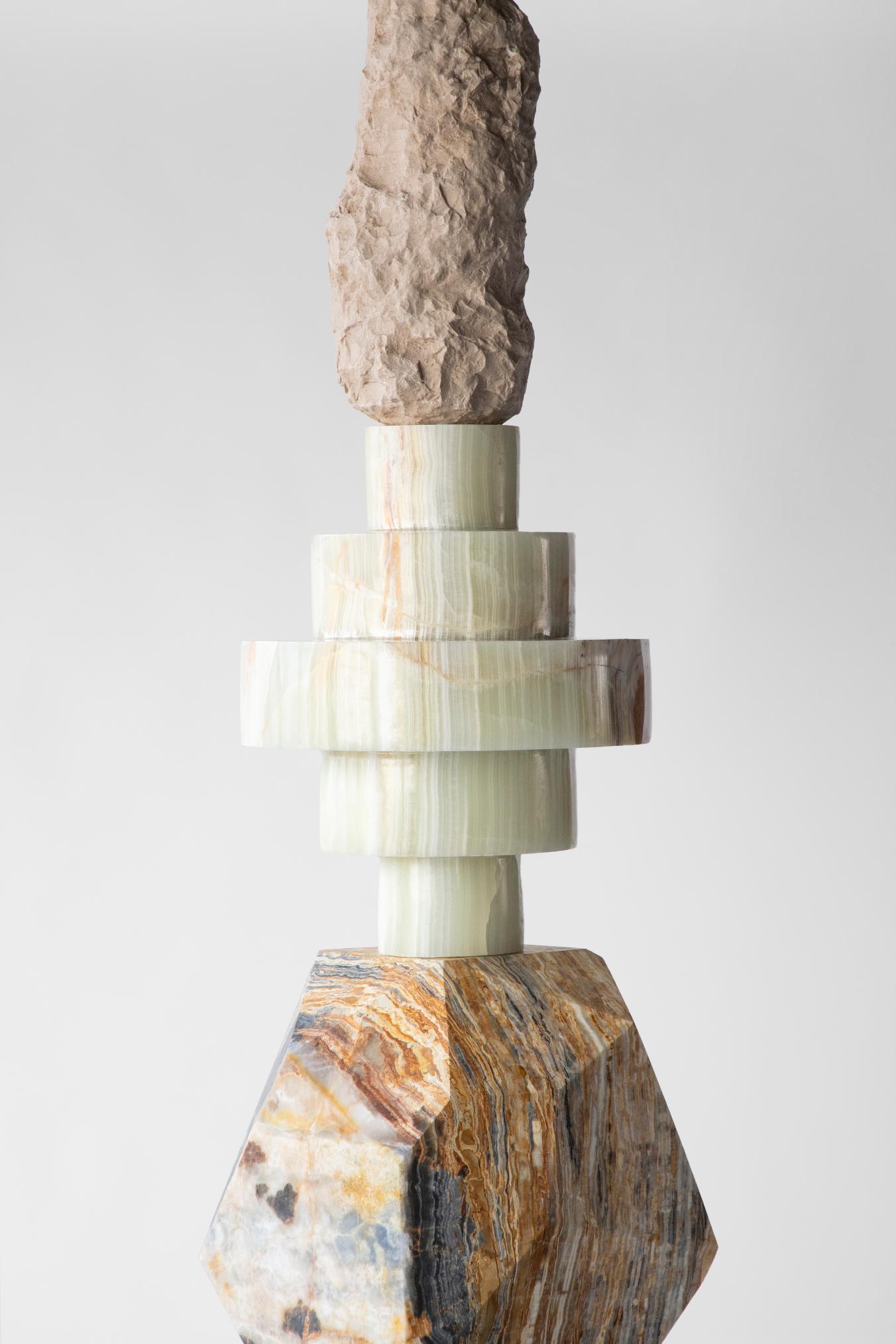 Materials: Travertine, olive green onyx, dark blue and golden onyx, jasper green onyx, Coca-Cola onyx, blue calcite
Indoors and covered outdoors
Cosmic Relics totems are limited edition of 8 + 1AP. Each sculpture has a different set of stones making